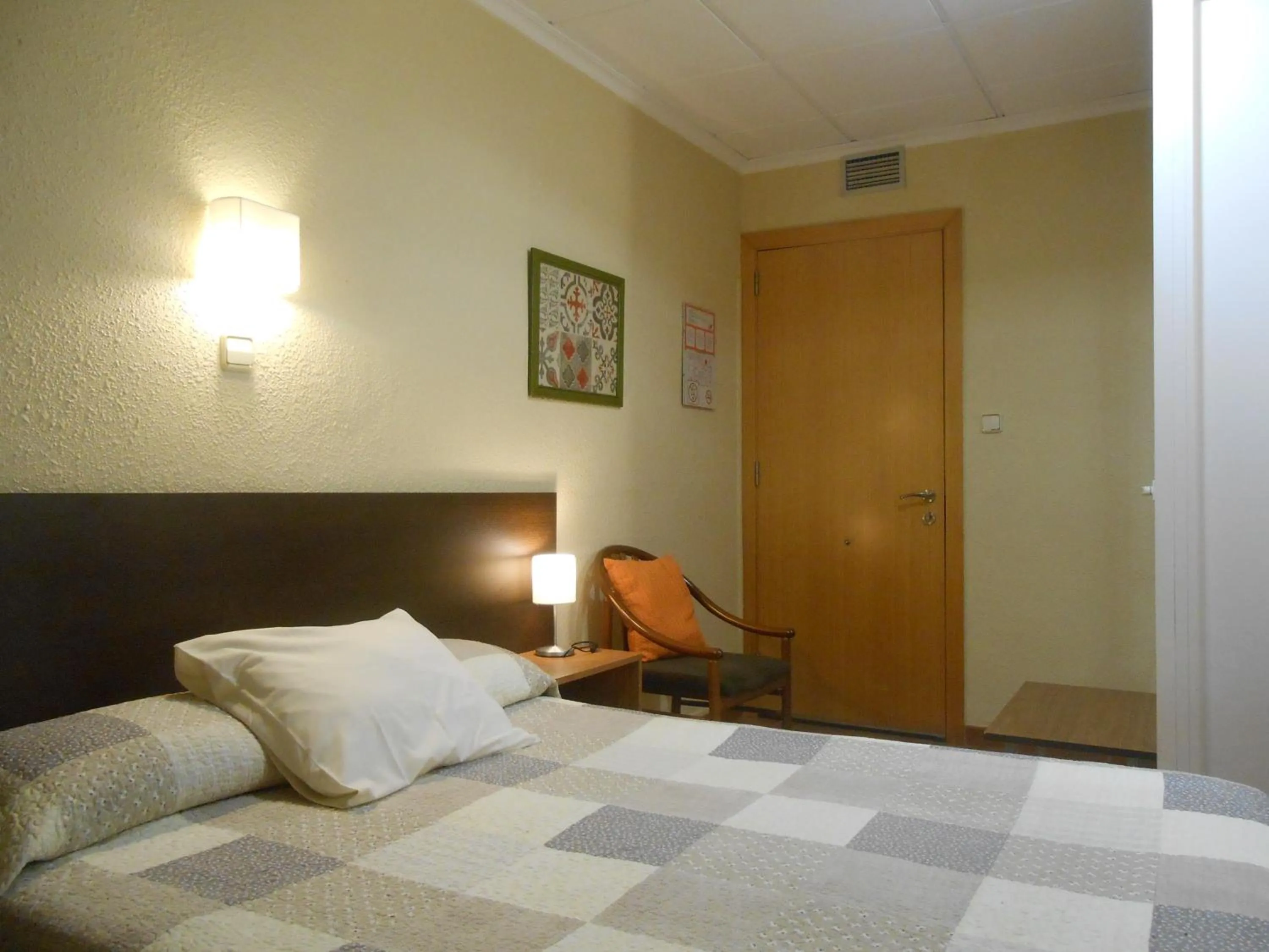 Bed in Hostal El Callejón