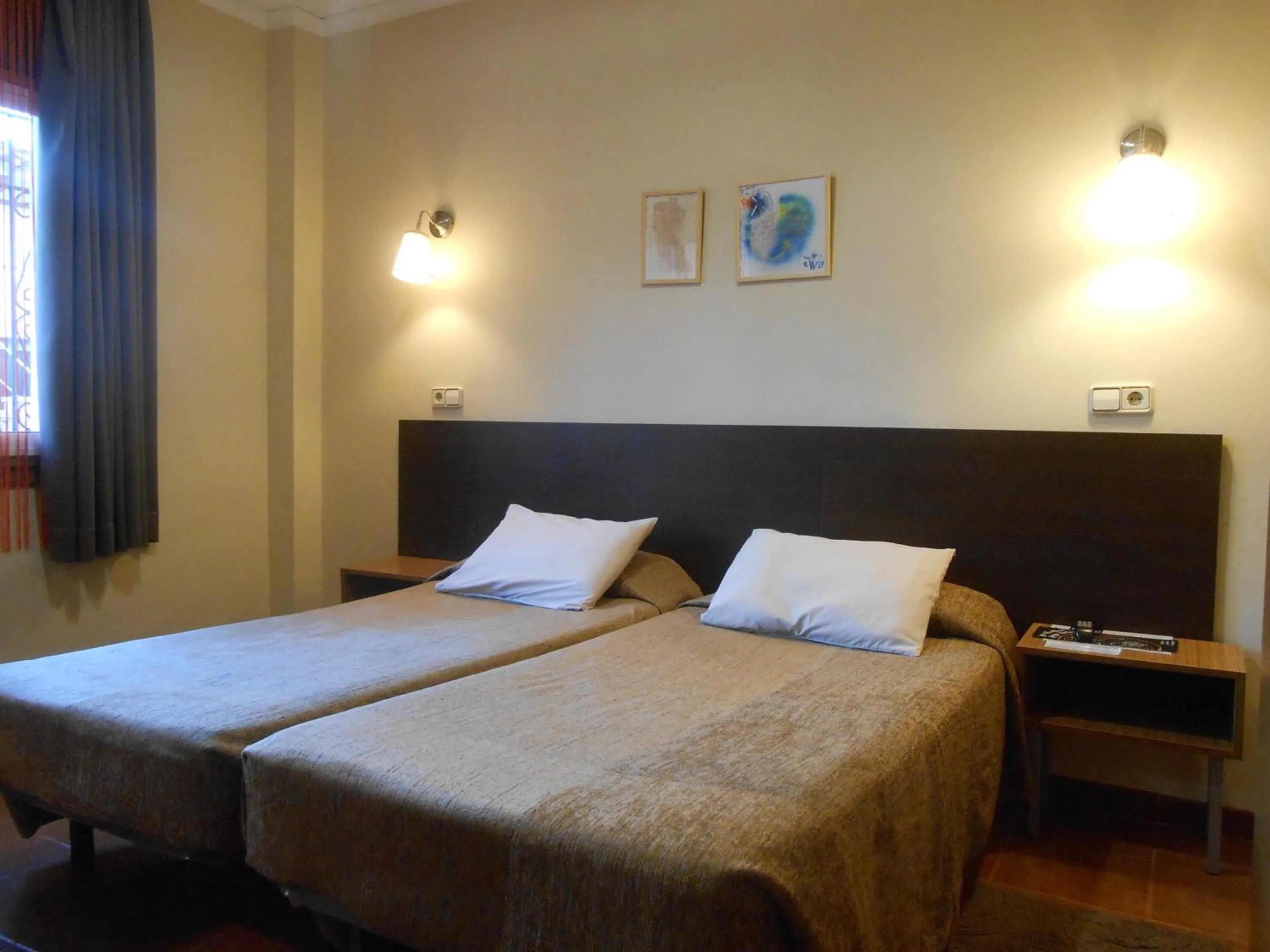 Bed in Hostal El Callejón