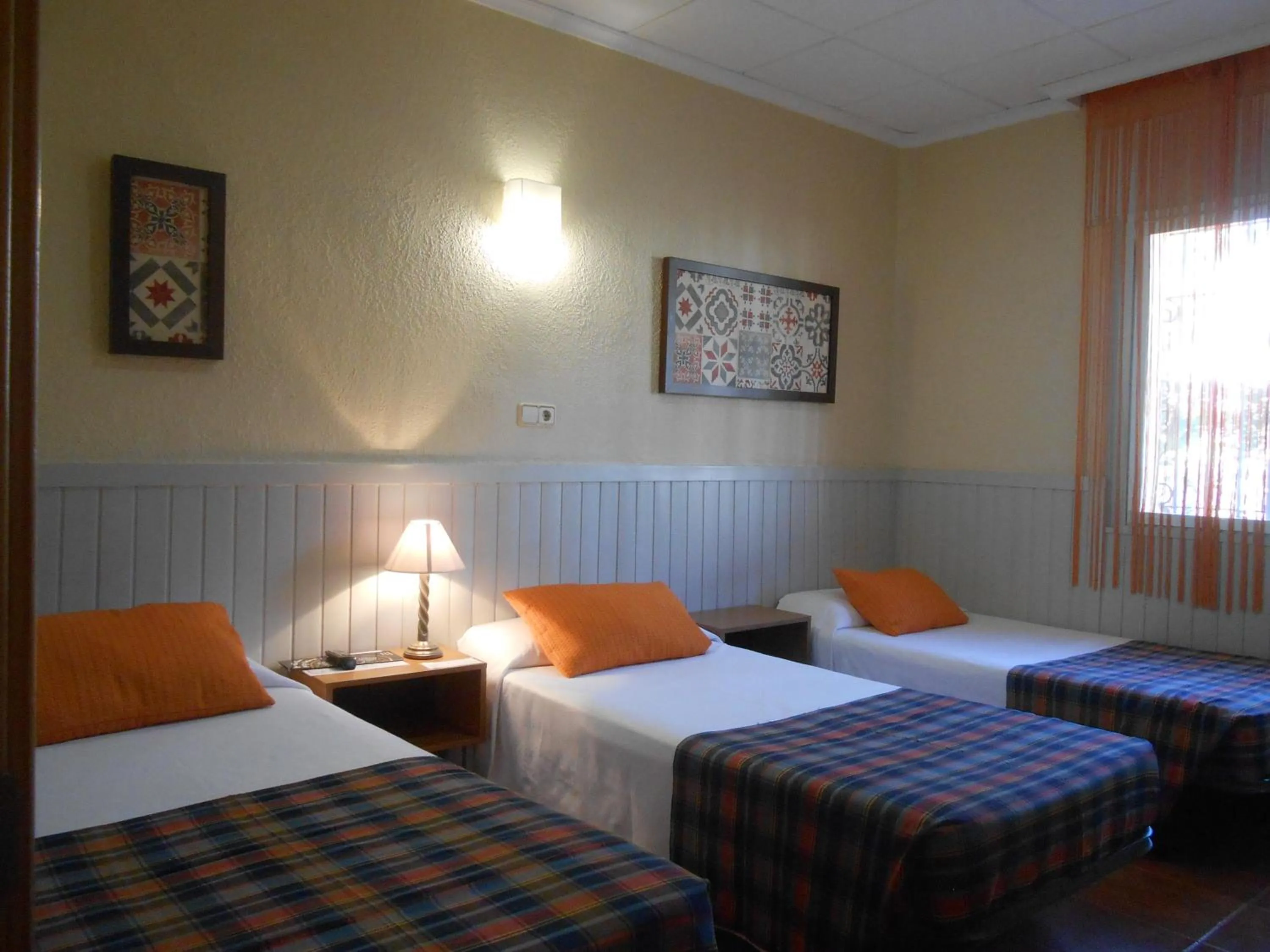 Bed in Hostal El Callejón