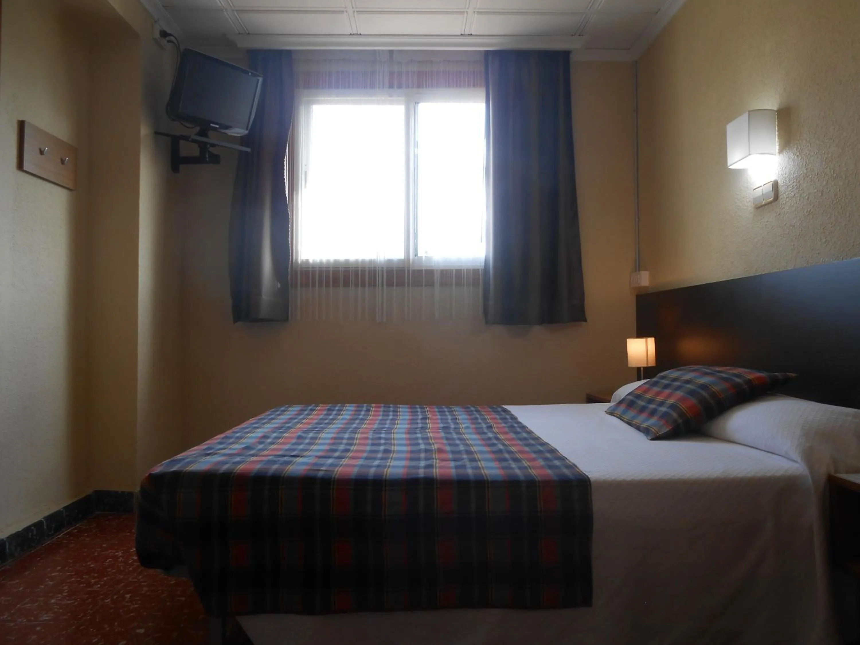 Photo of the whole room, Bed in Hostal El Callejón