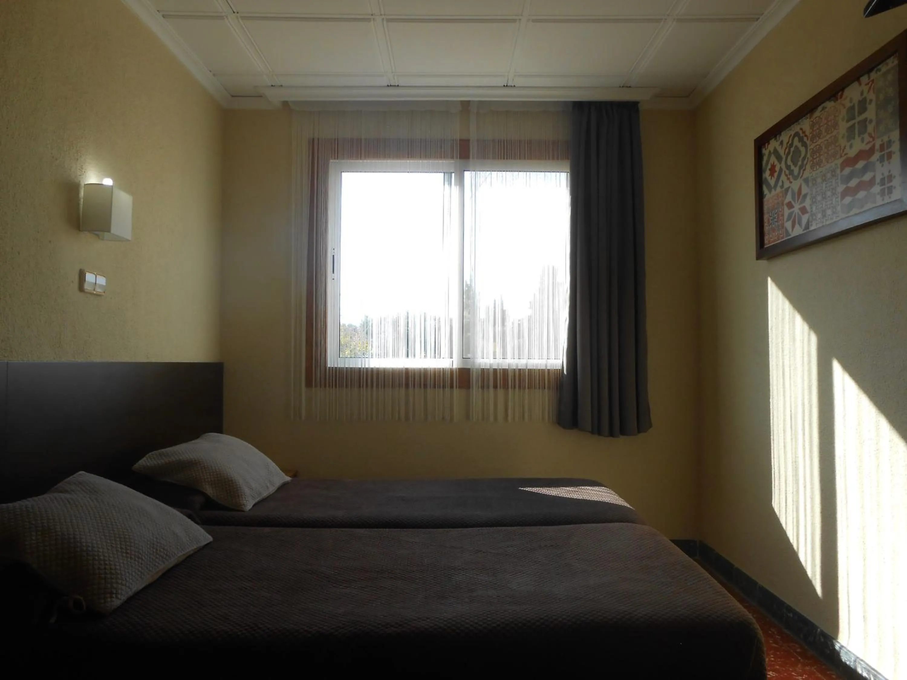 Bed in Hostal El Callejón