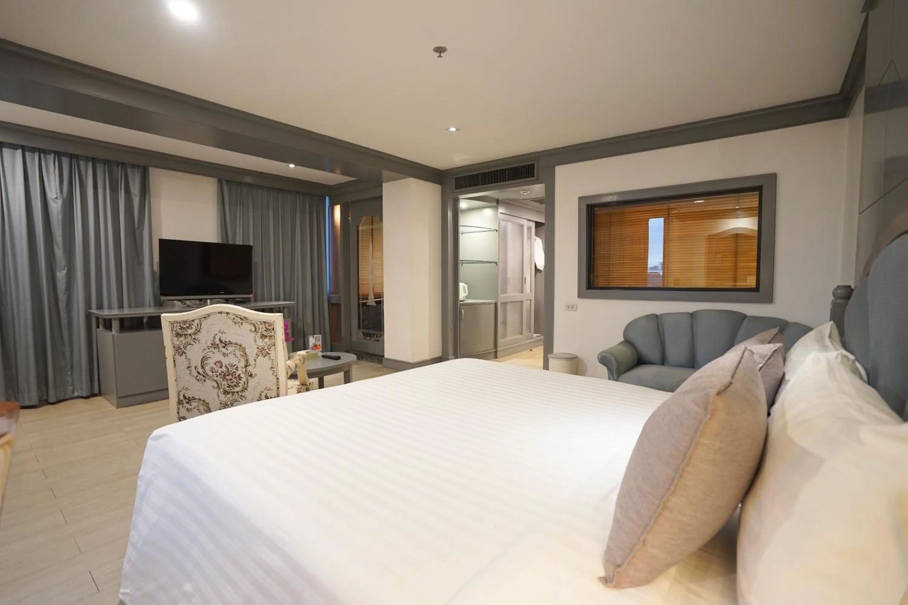 Bed in King Park Avenue Hotel Bangkok