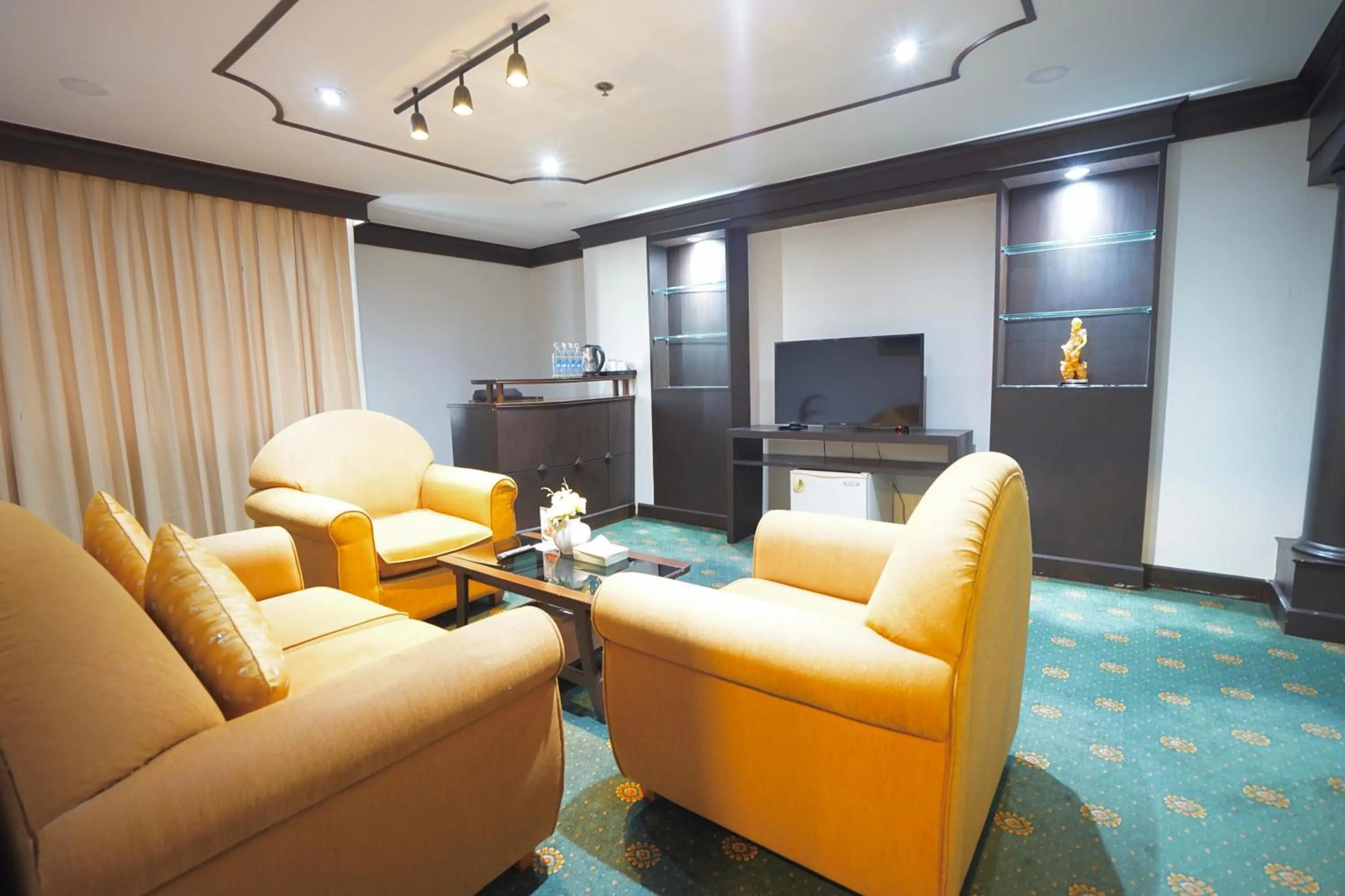 Living room in King Park Avenue Hotel Bangkok