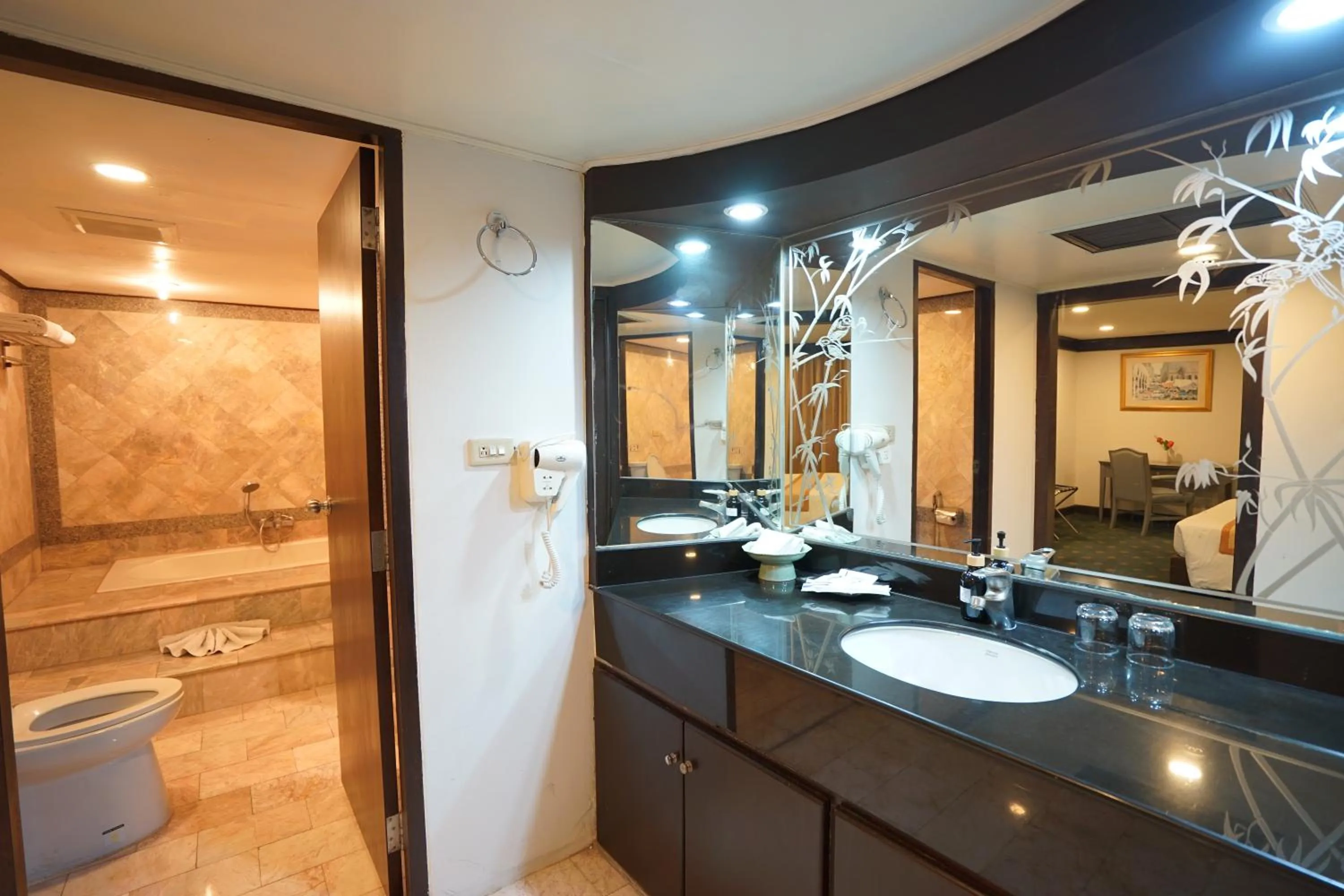 Bathroom in King Park Avenue Hotel Bangkok