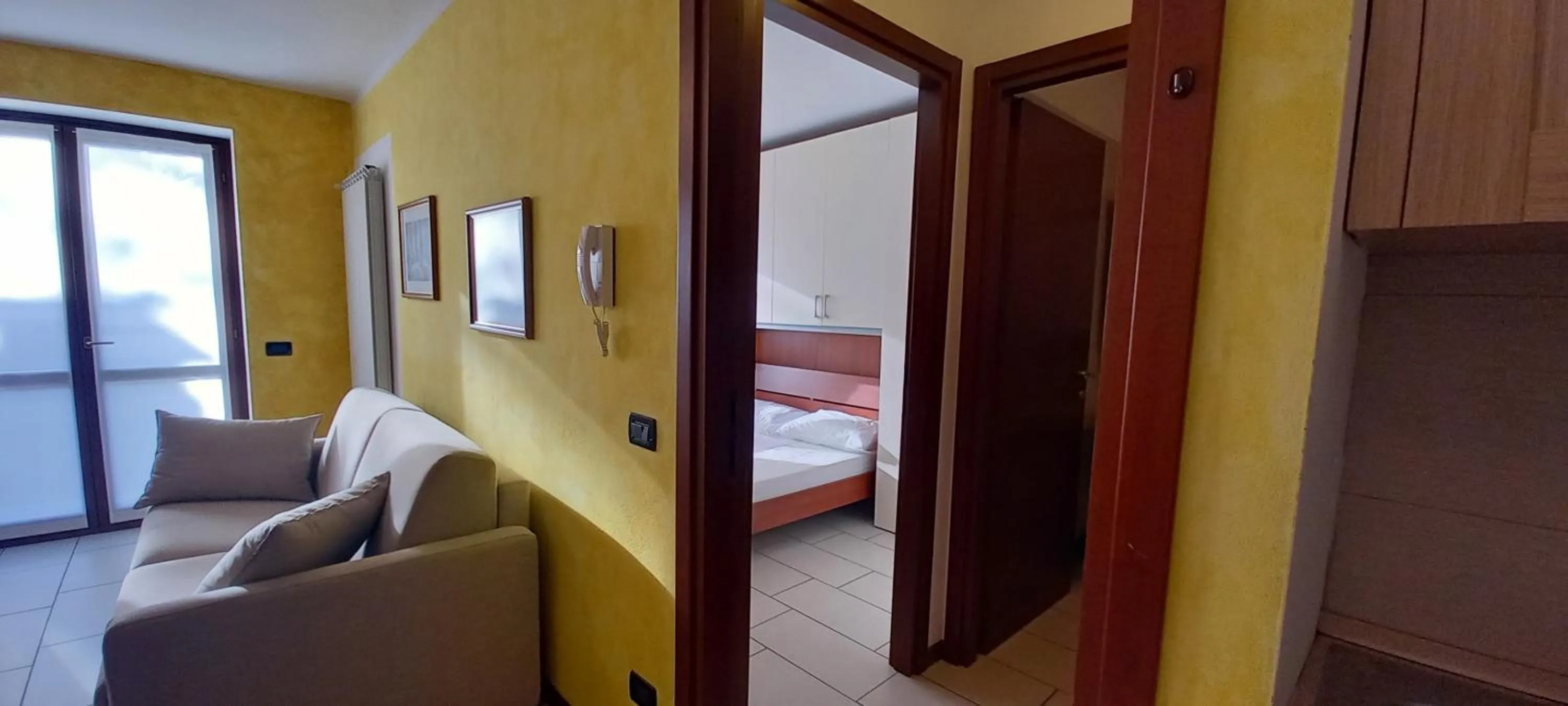 Living room, Bed in Stelviostay Residence Stelvio