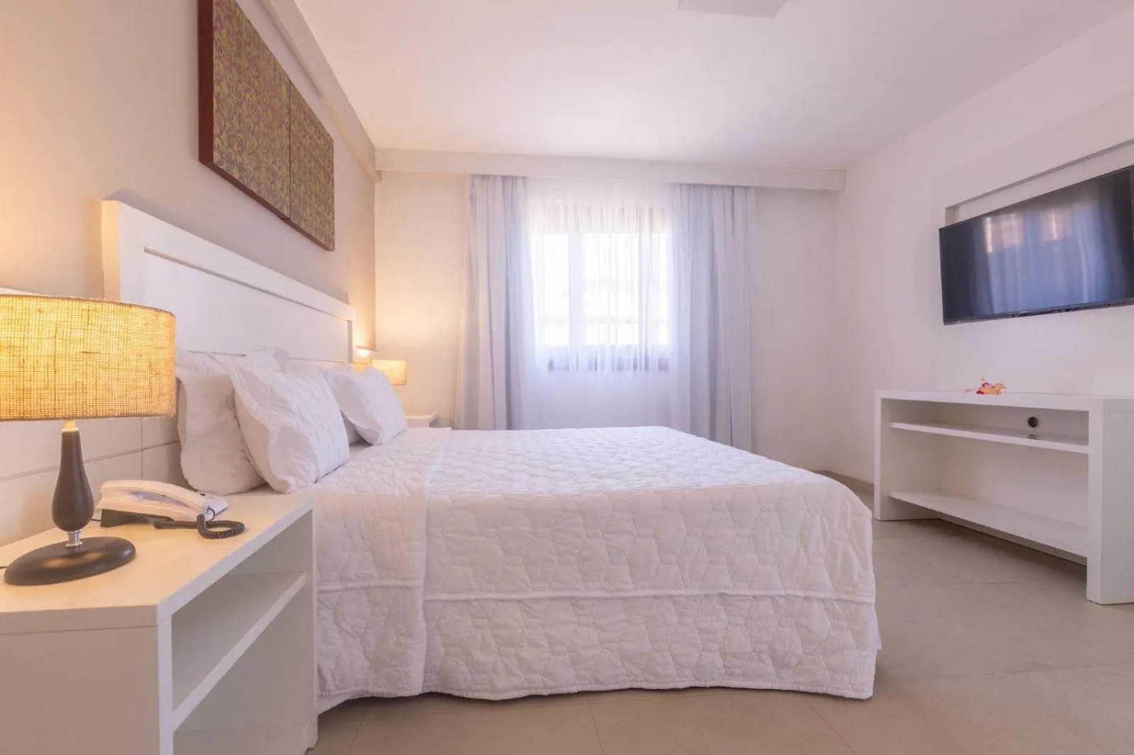 Bed in Pousada dos Tangarás