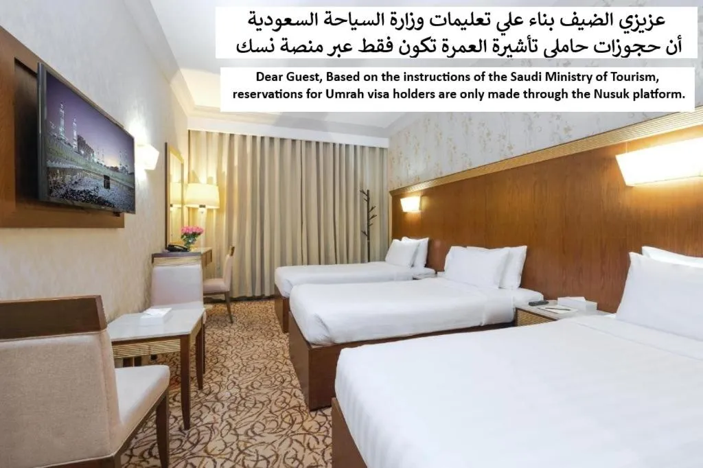 Bed in Dhiafat Al Raja Hotel