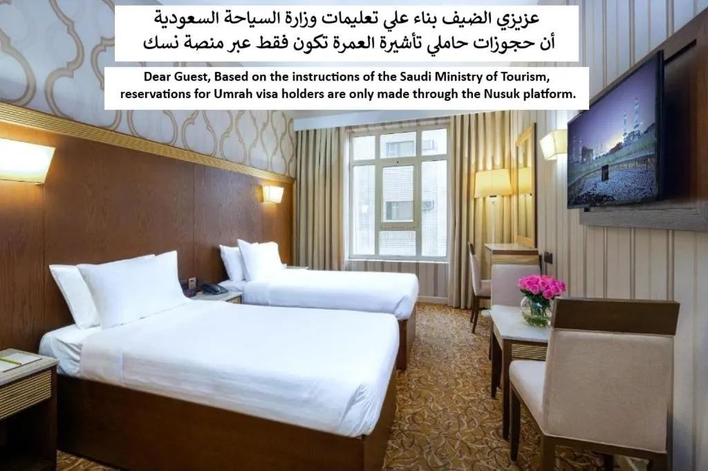 Bed in Dhiafat Al Raja Hotel