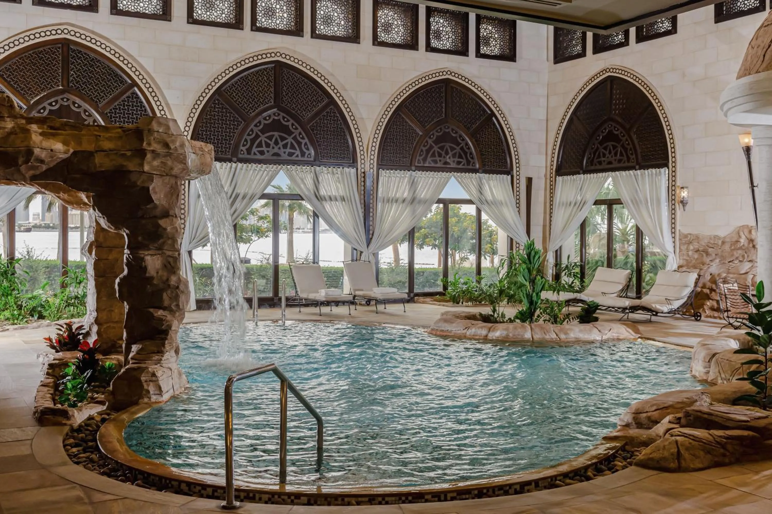 Swimming pool in Sharq Village & Spa, a Ritz-Carlton Hotel