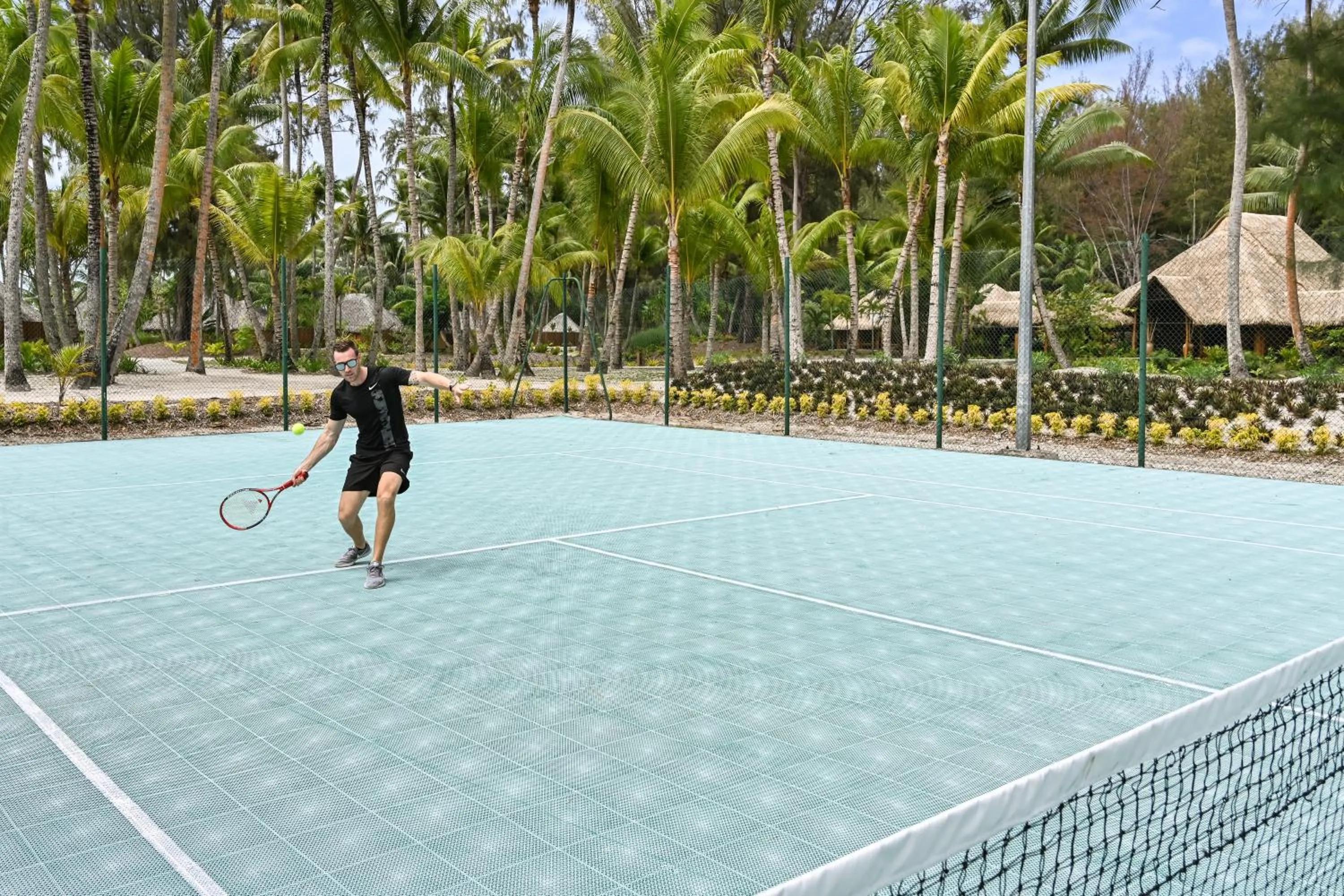 Tennis court in Le Bora Bora by Pearl Resorts