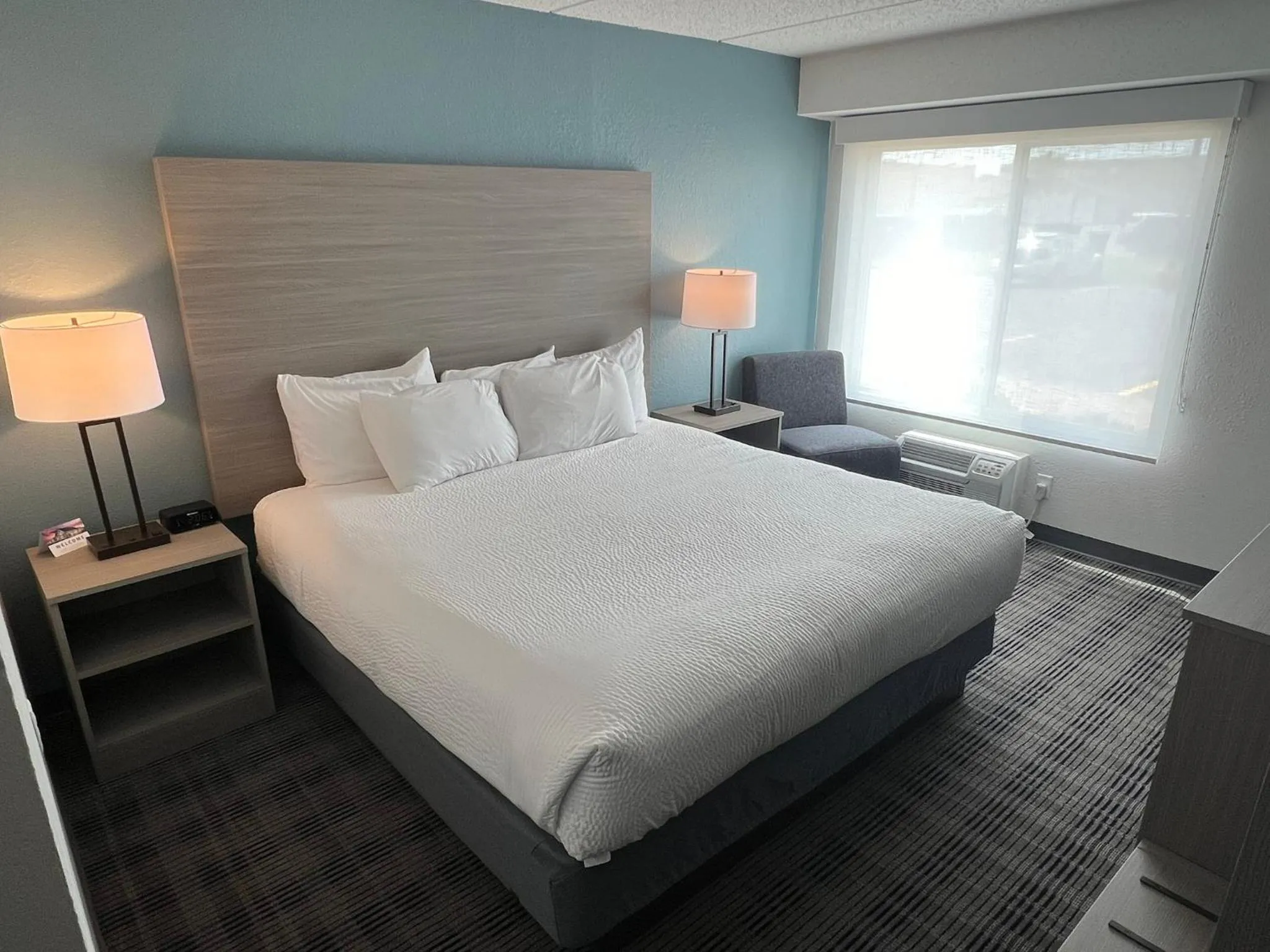 Bedroom, Bed in AmericInn by Wyndham Baxter Brainerd