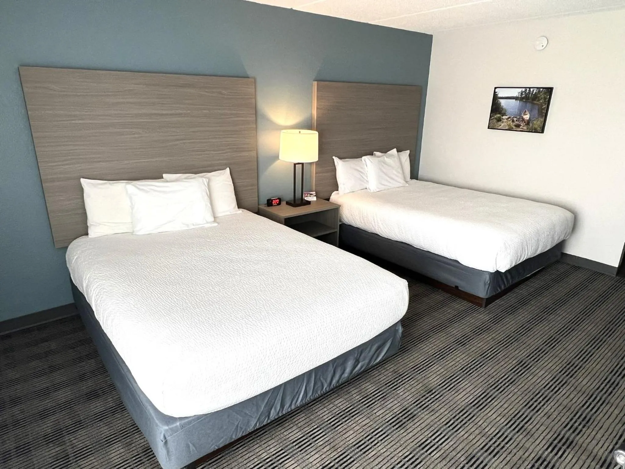 Bedroom, Bed in AmericInn by Wyndham Baxter Brainerd