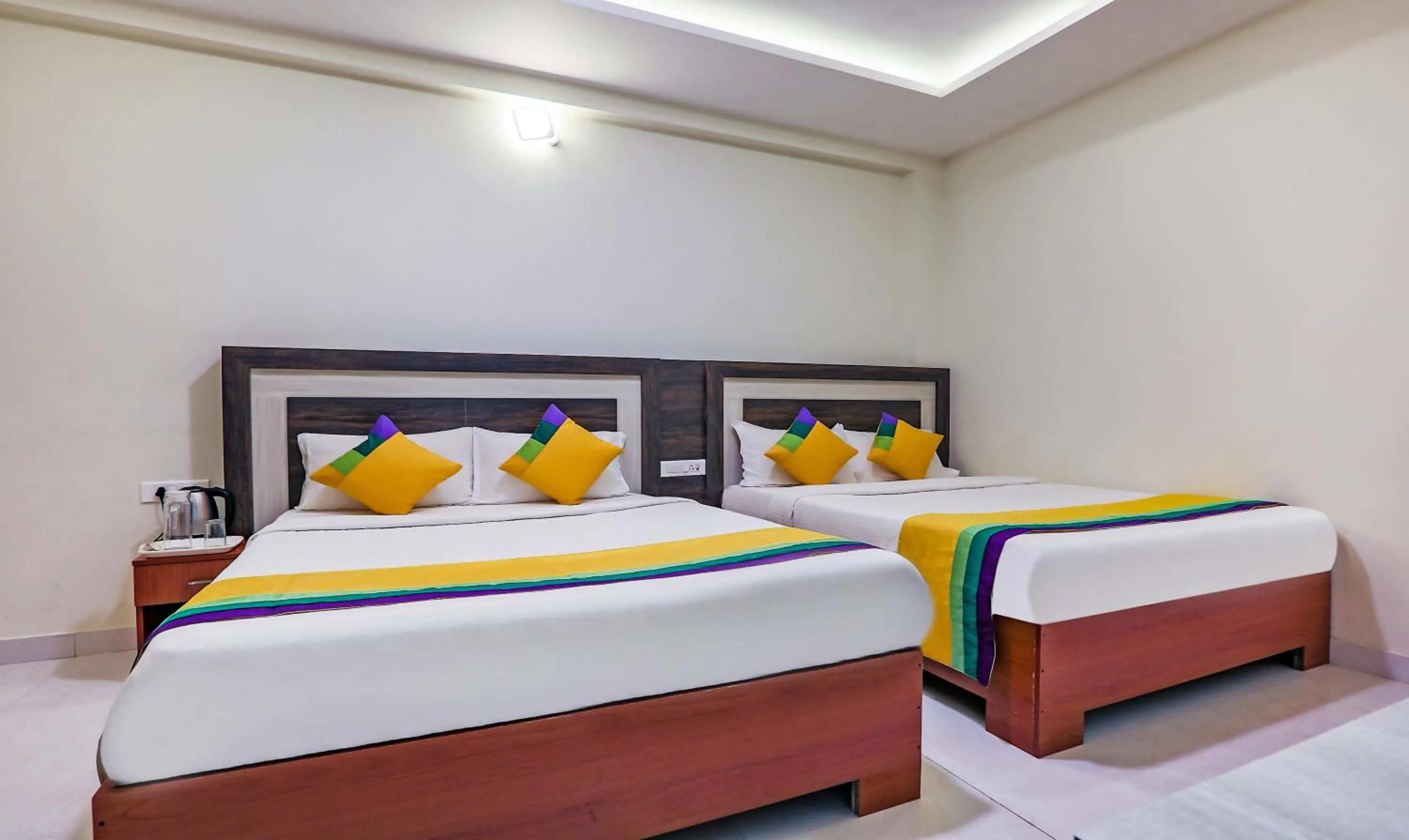 Bedroom, Bed in Itsy Hotels Kottaram Residency, 10 Mins To Botanical Garden
