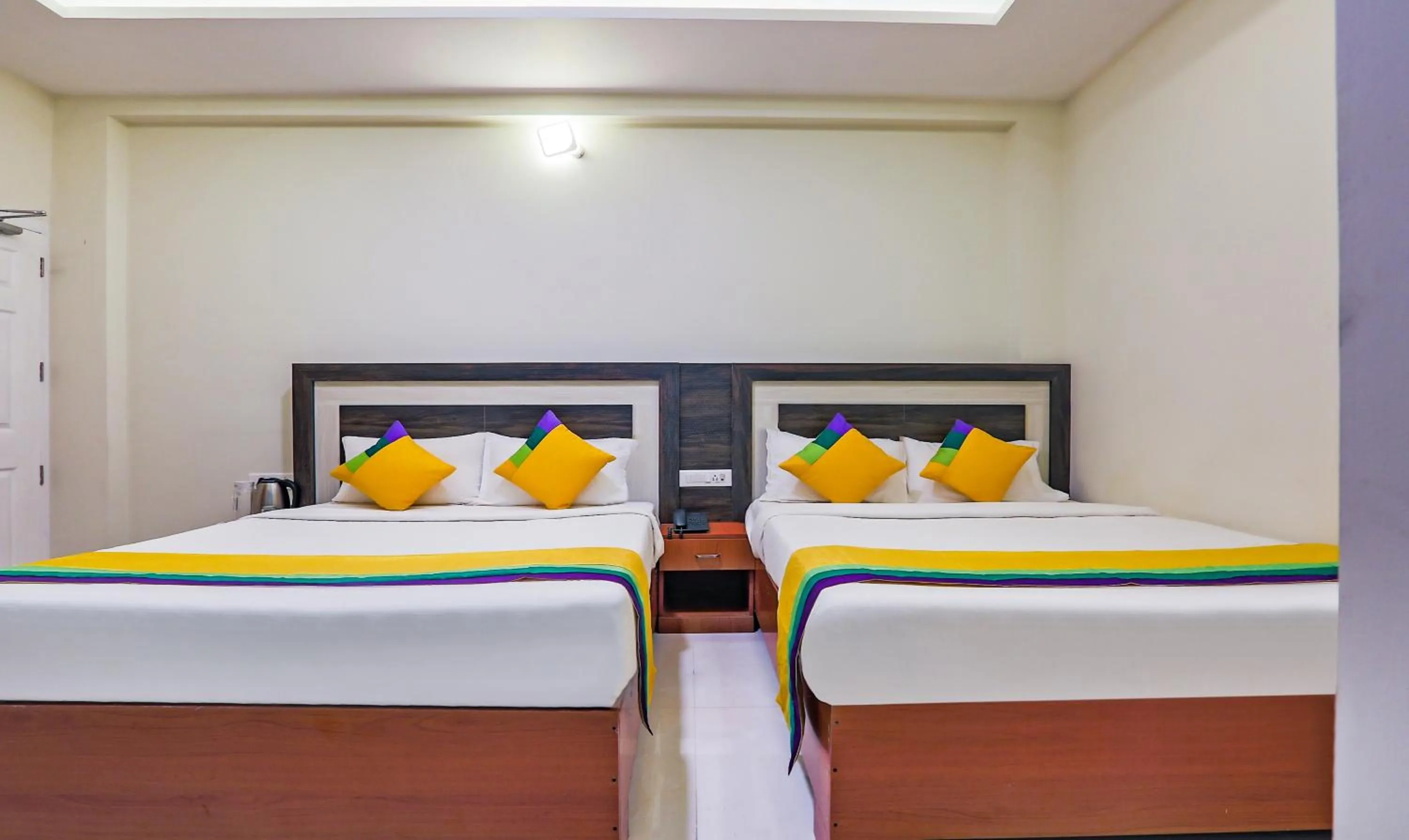 Bedroom, Bed in Itsy Hotels Kottaram Residency, 10 Mins To Botanical Garden