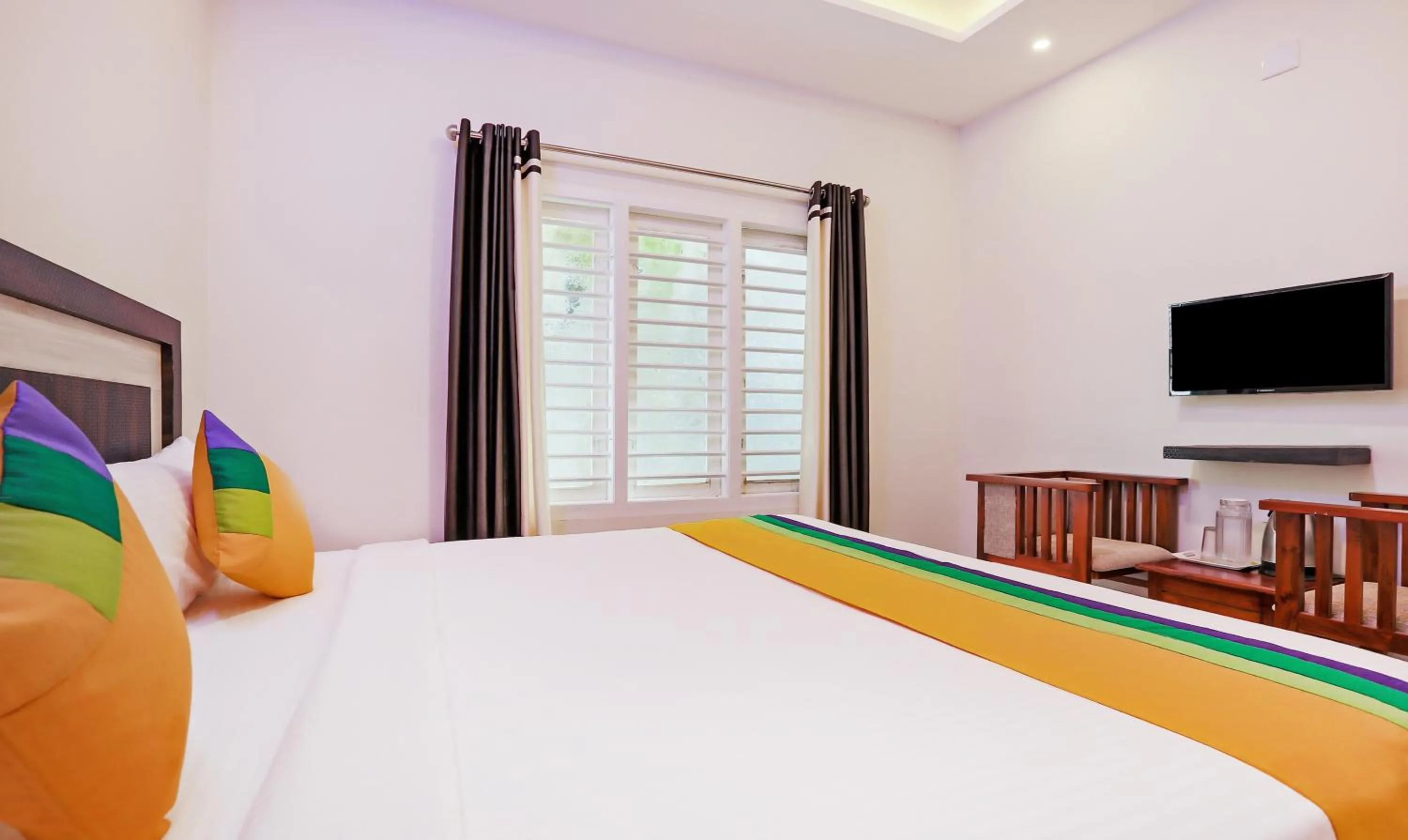 Bedroom, Bed in Itsy Hotels Kottaram Residency, 10 Mins To Botanical Garden