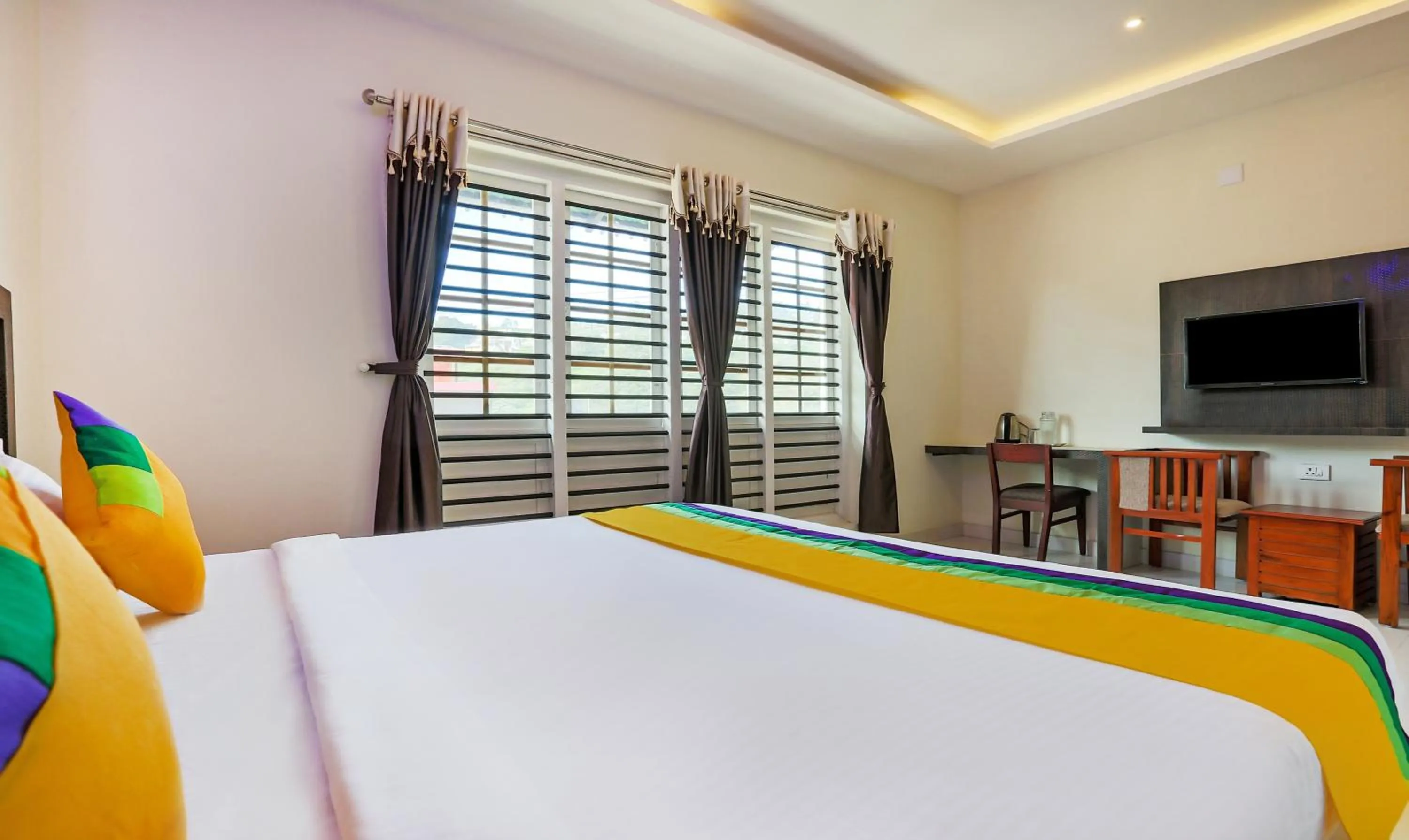 Bedroom, Bed in Itsy Hotels Kottaram Residency, 10 Mins To Botanical Garden