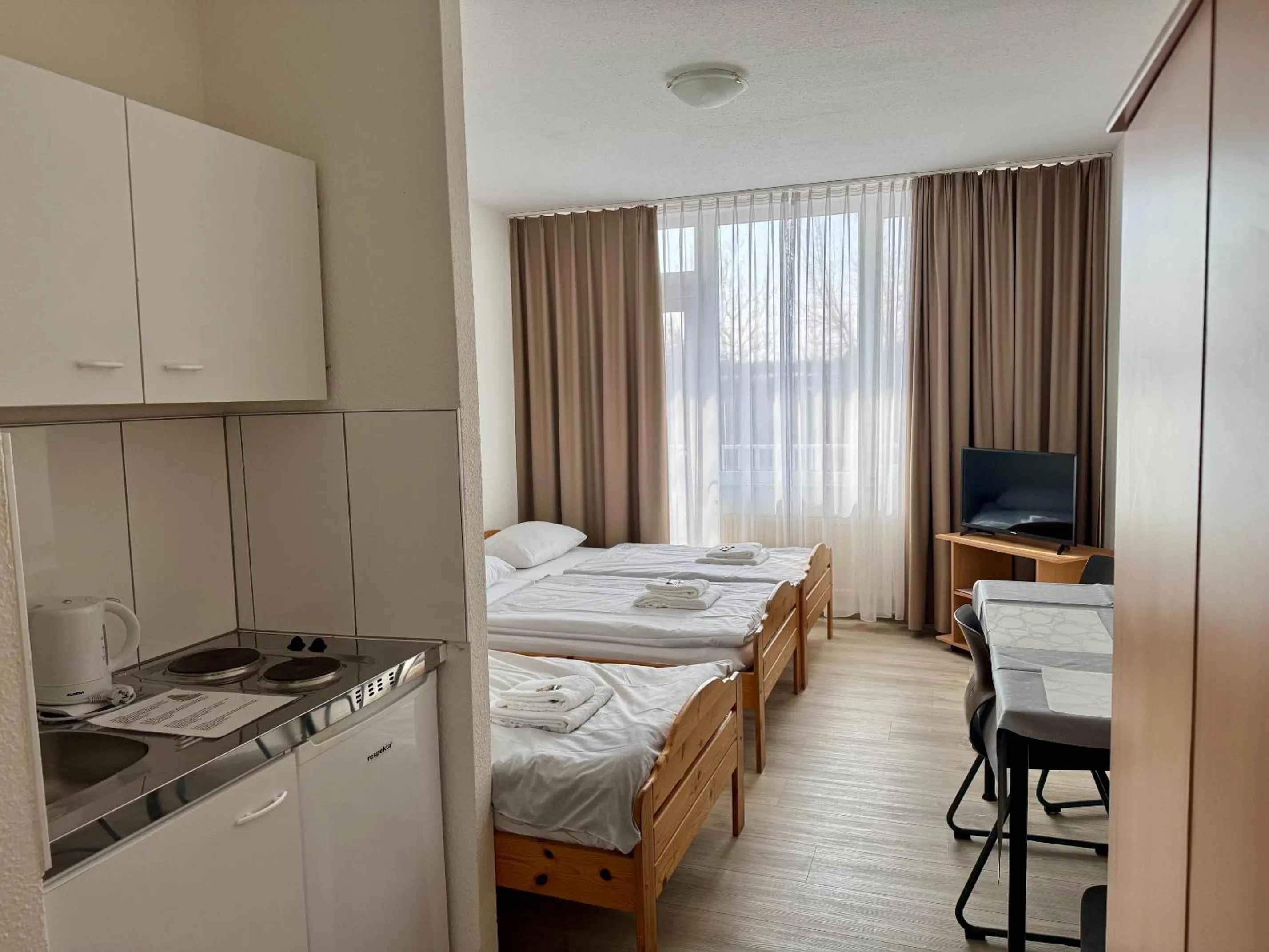 Photo of the whole room, Bed in Gästehaus Haßloch/Pfalz