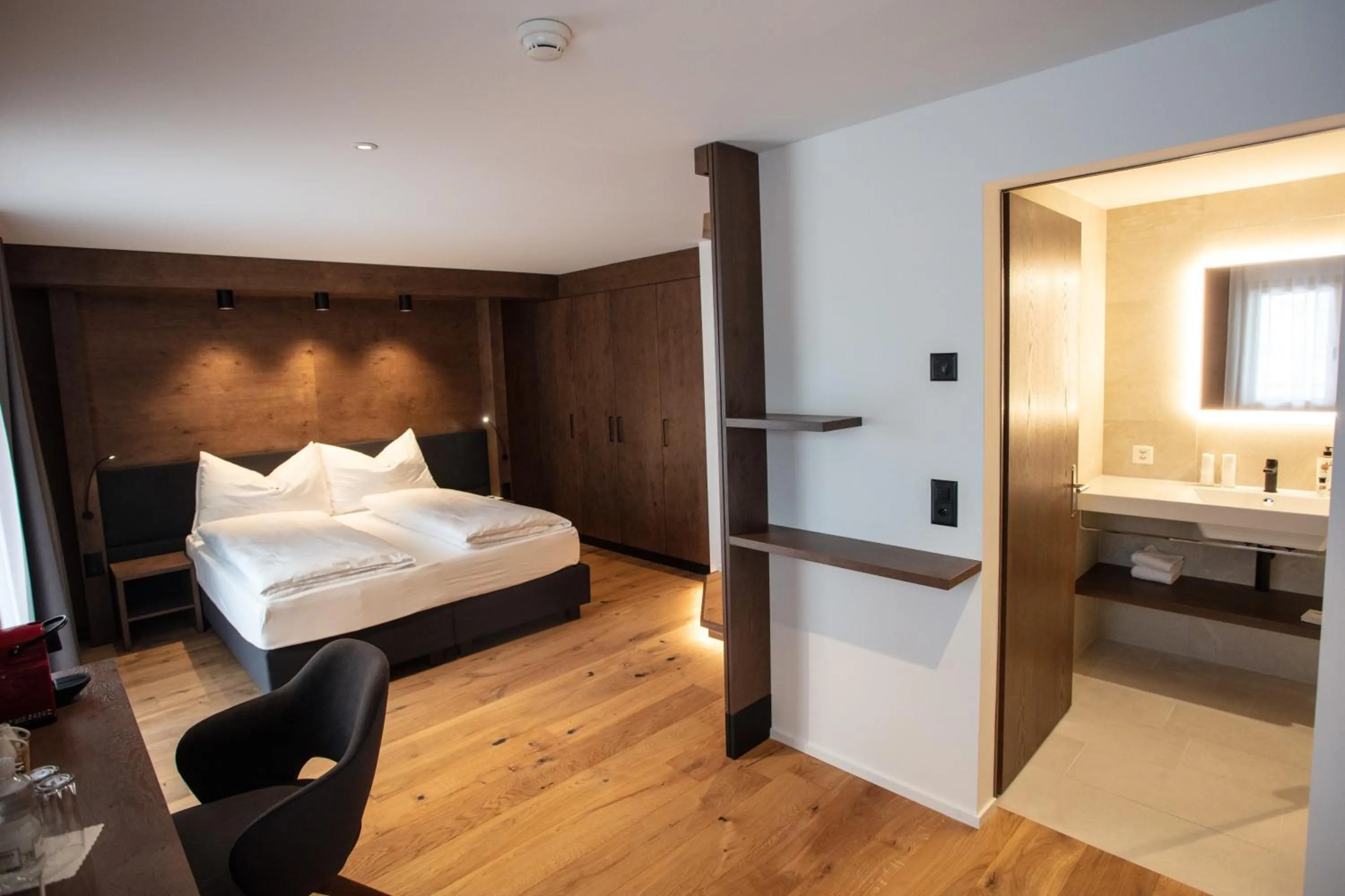 Photo of the whole room, Bed in Posthotel Valbella - Berge, Spa & Wir