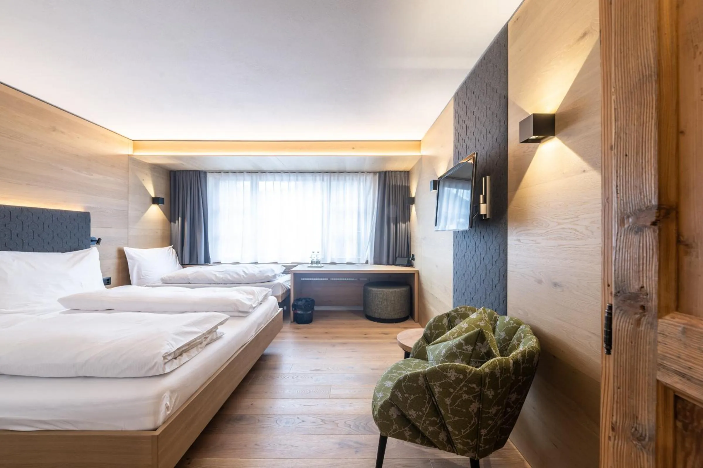 Photo of the whole room, Bed in Posthotel Valbella - Berge, Spa & Wir