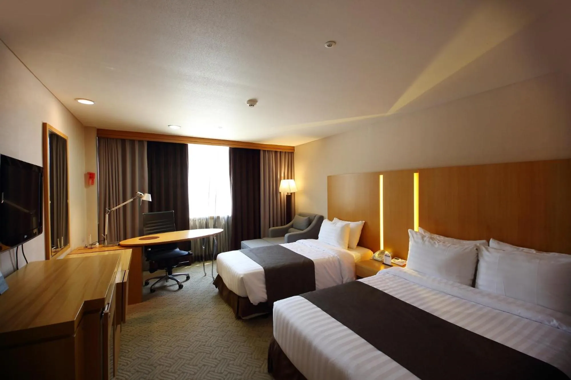 Bed in Ramada by Wyndham Songdo