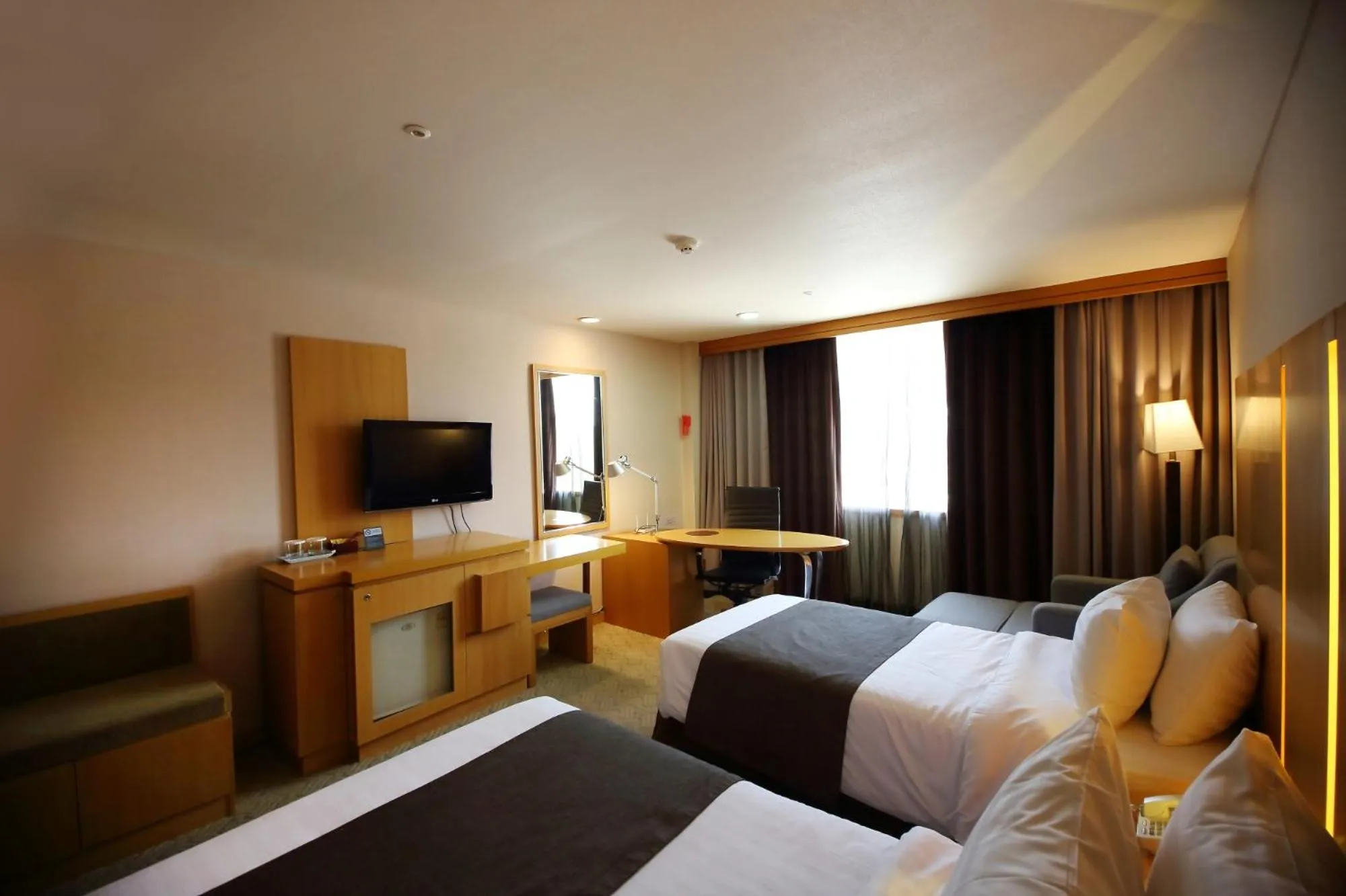 Bed in Ramada by Wyndham Songdo