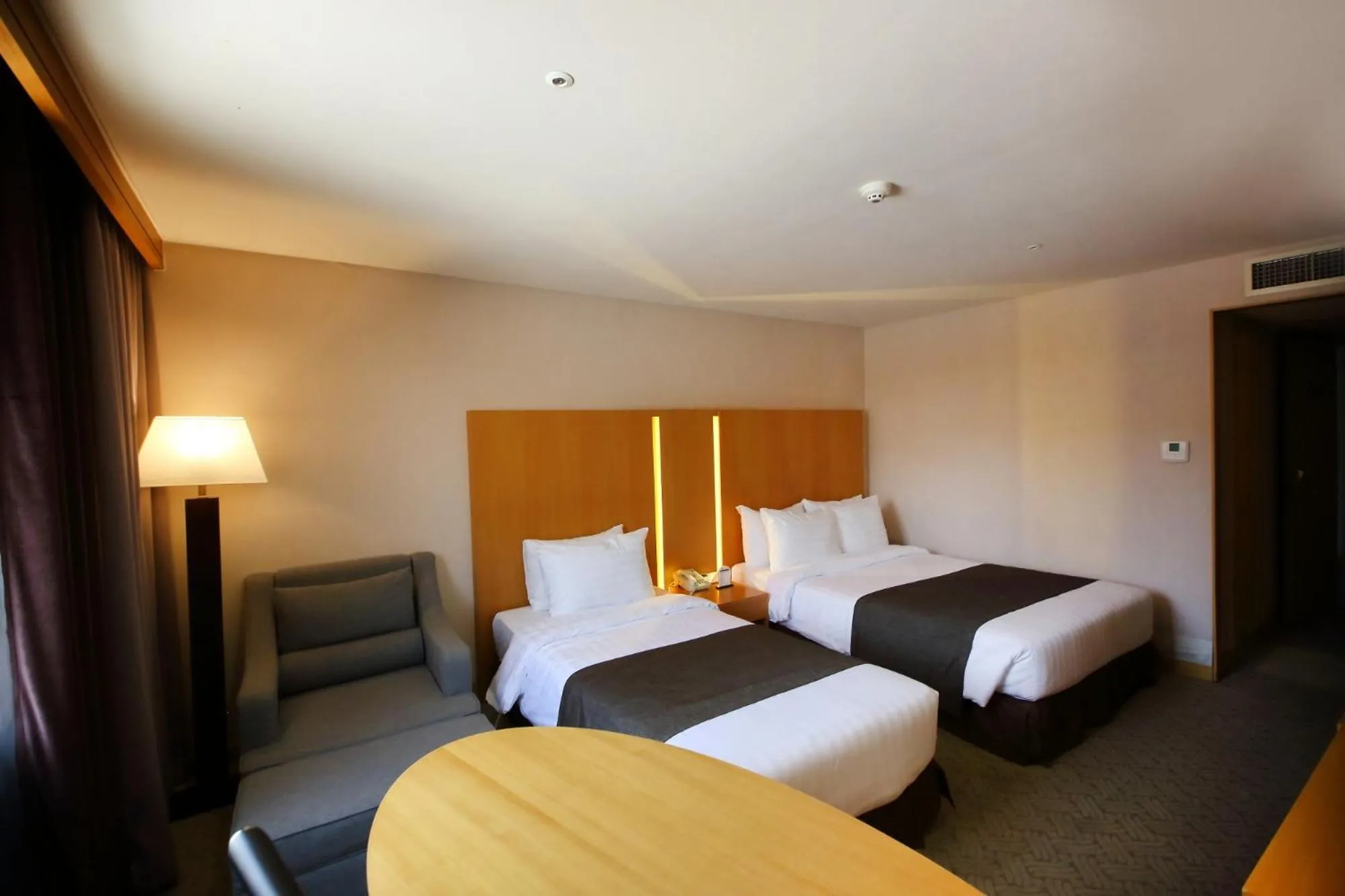 Bed in Ramada by Wyndham Songdo