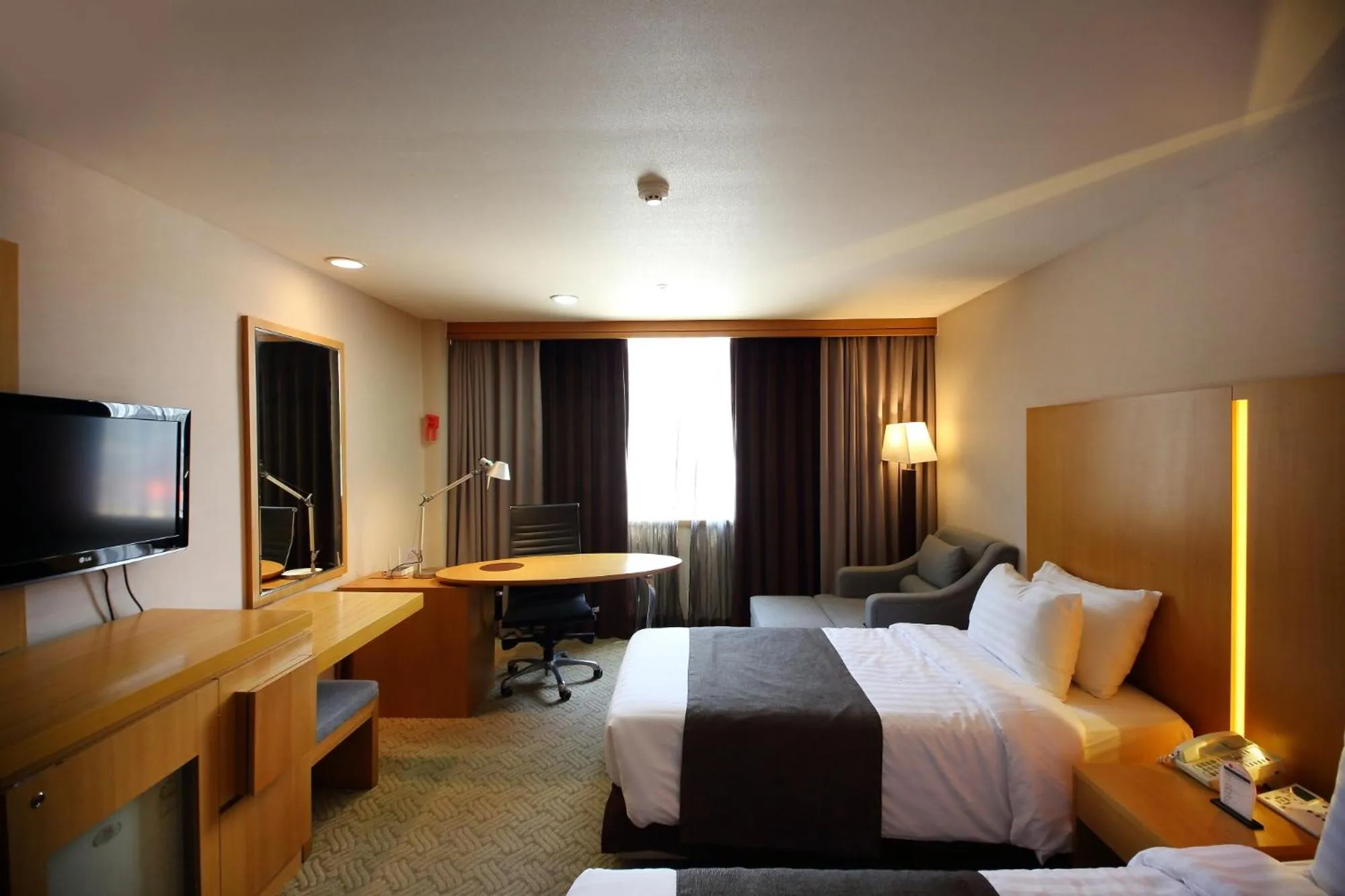 Bed in Ramada by Wyndham Songdo
