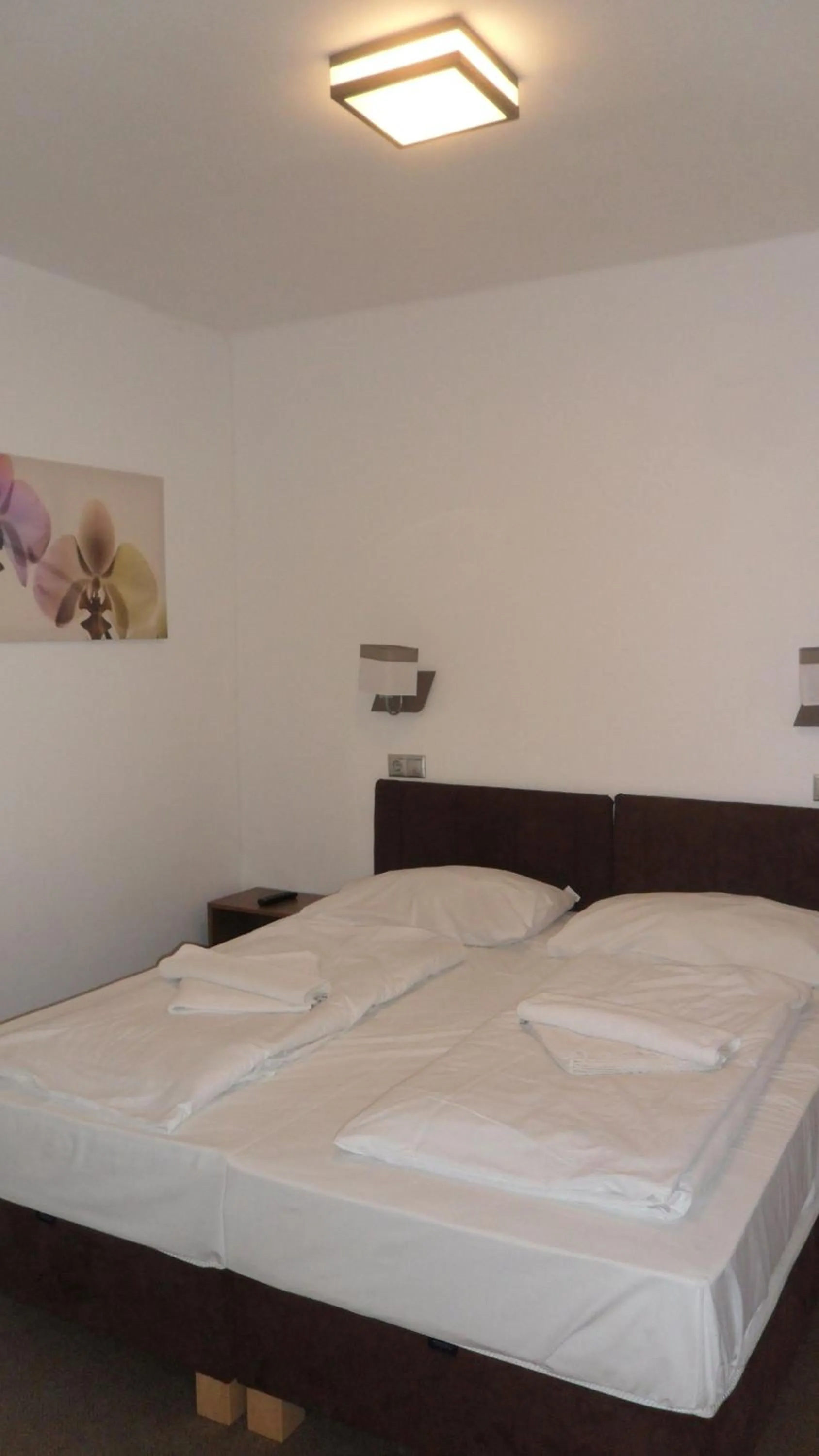 Bed in Nereus Park Hotel