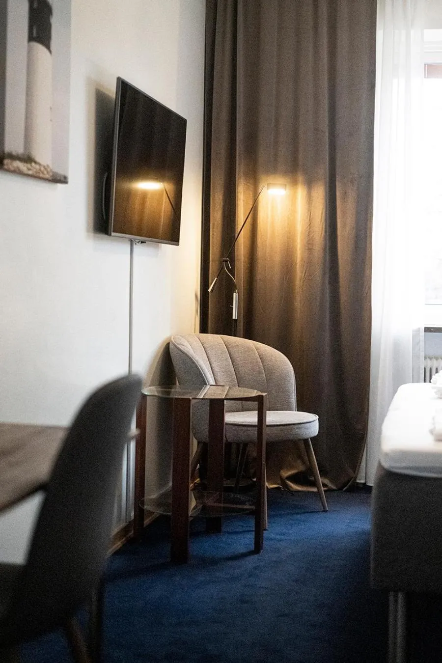 Seating area, Bed in Best Western Sjofartshotellet