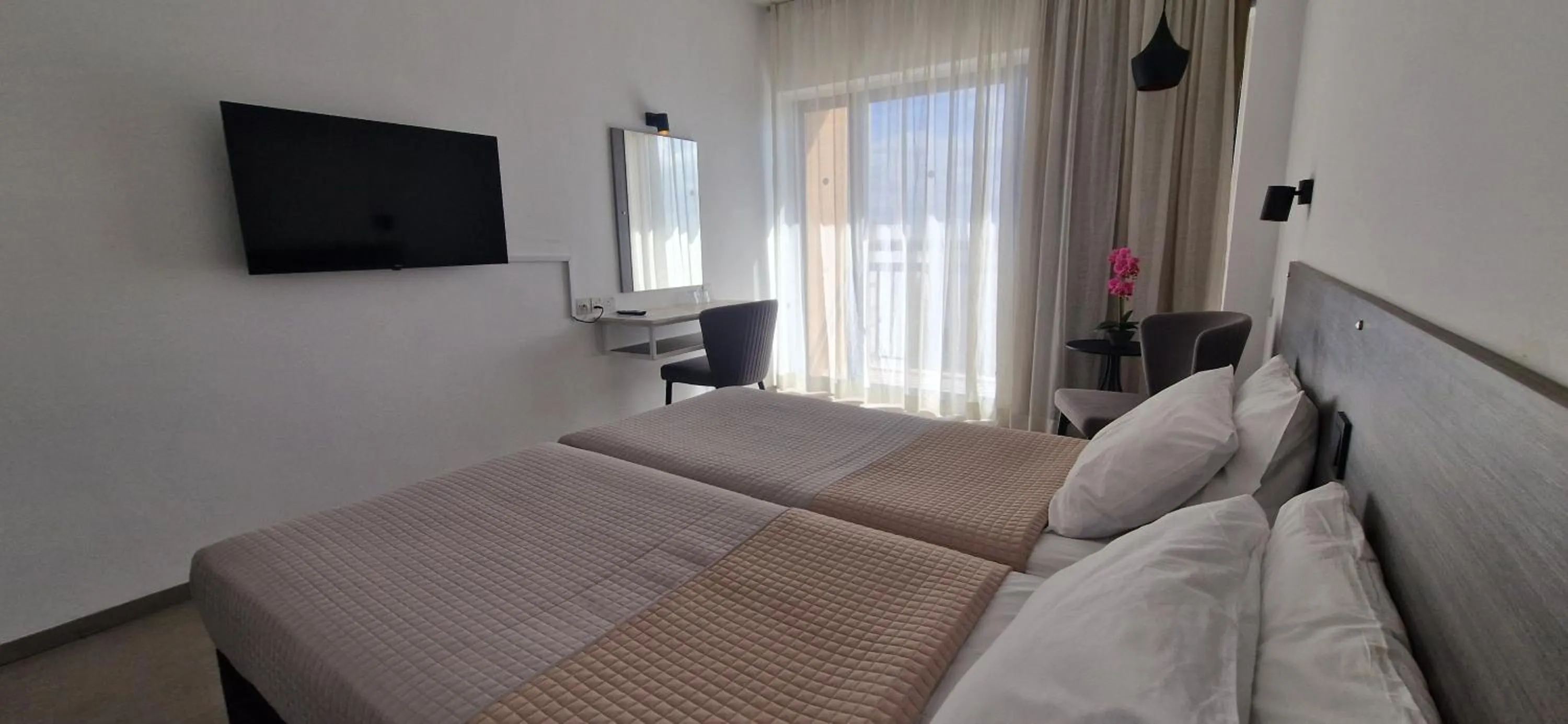 Bed in Navarria Blue Hotel