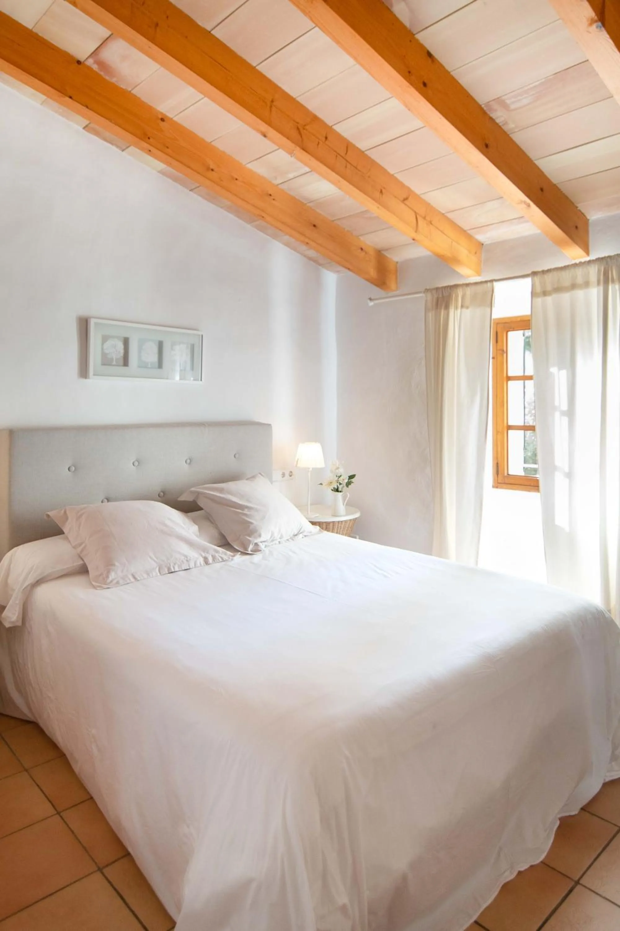 Bedroom, Bed in Finca Ca'n Quatre