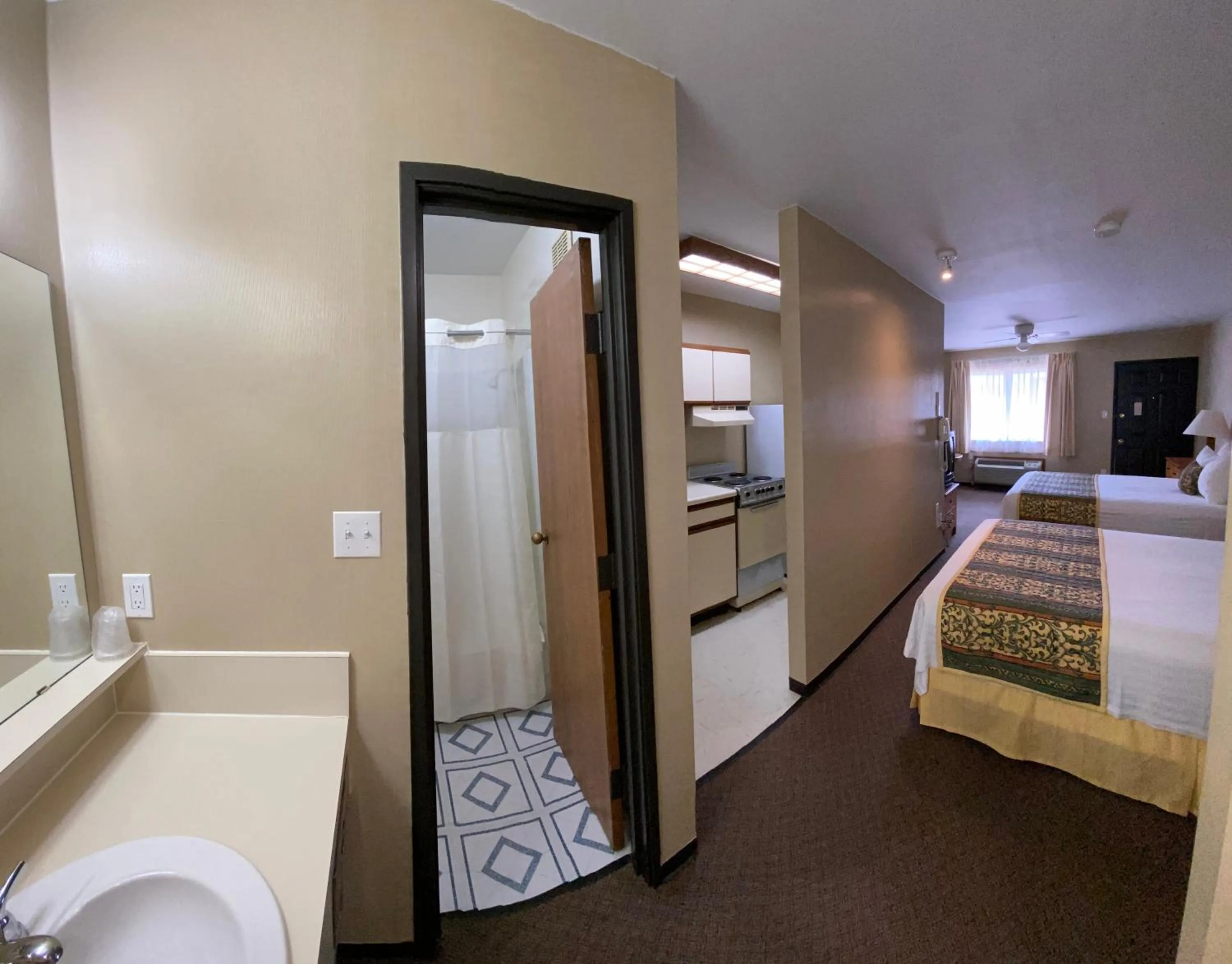 Bed in Thunderbird Lodge, Norman, OK