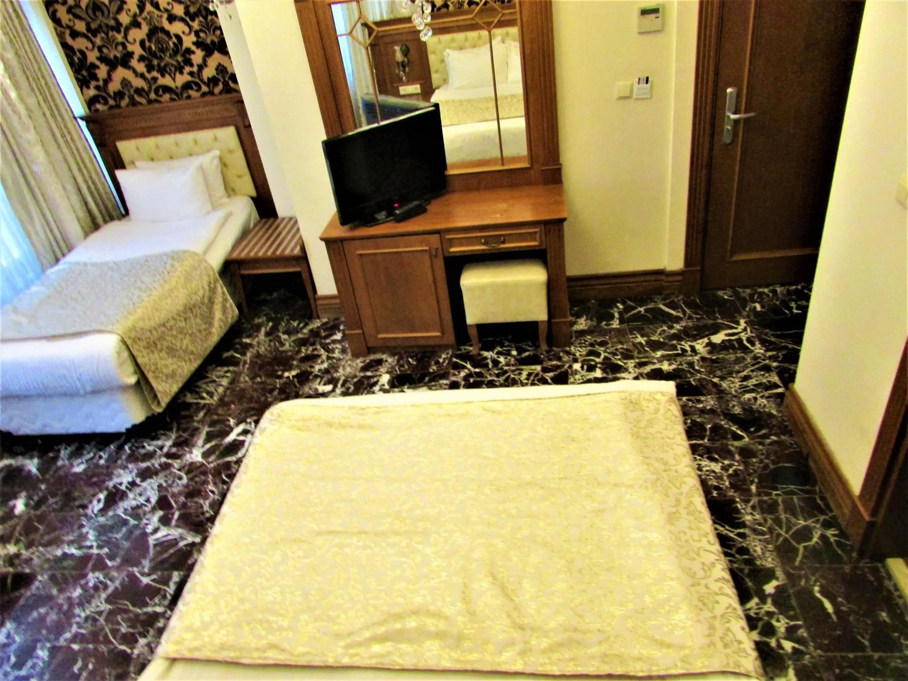 Photo of the whole room in Lausos Hotel Sultanahmet