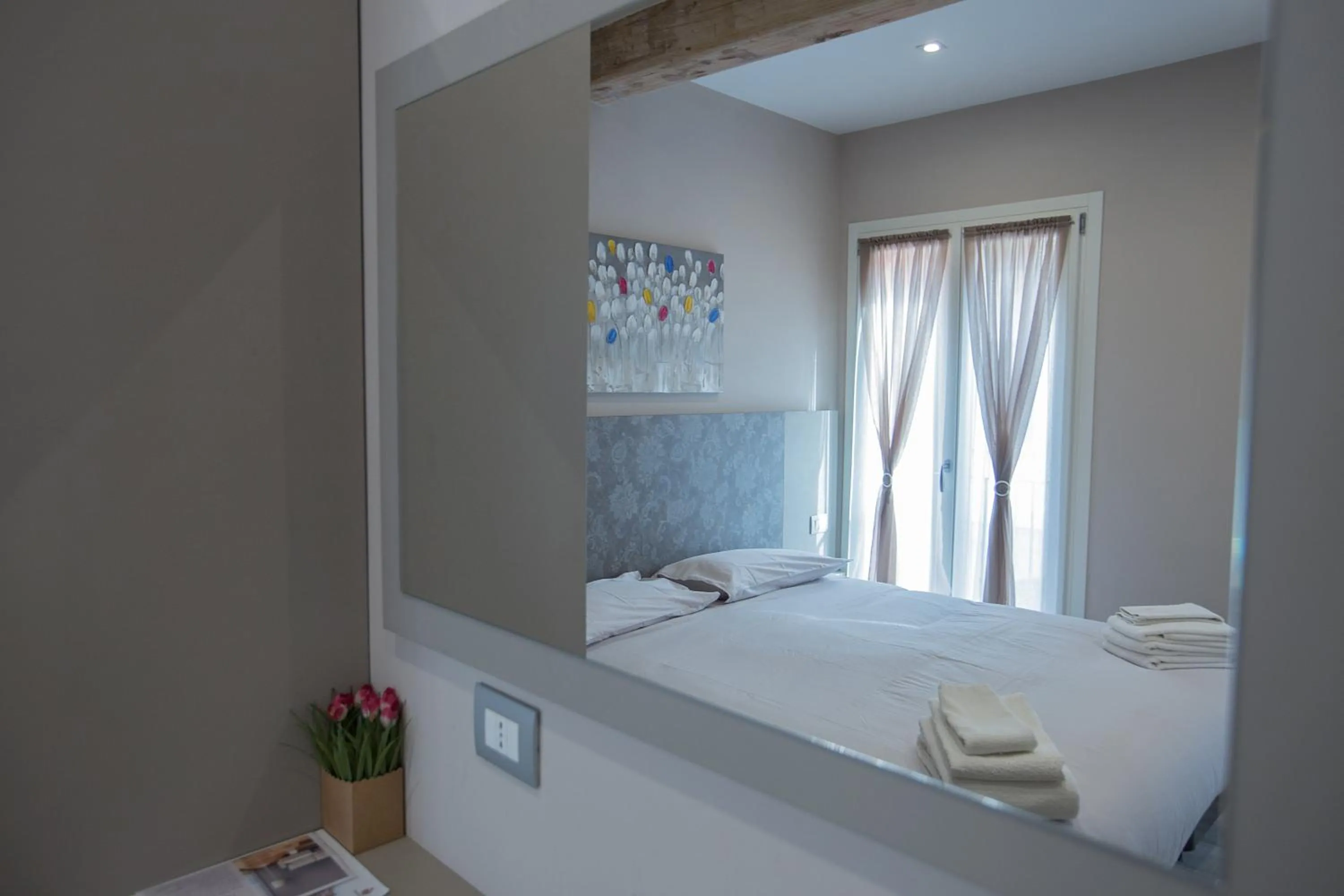 Bed in Lanterna Room&Breakfast