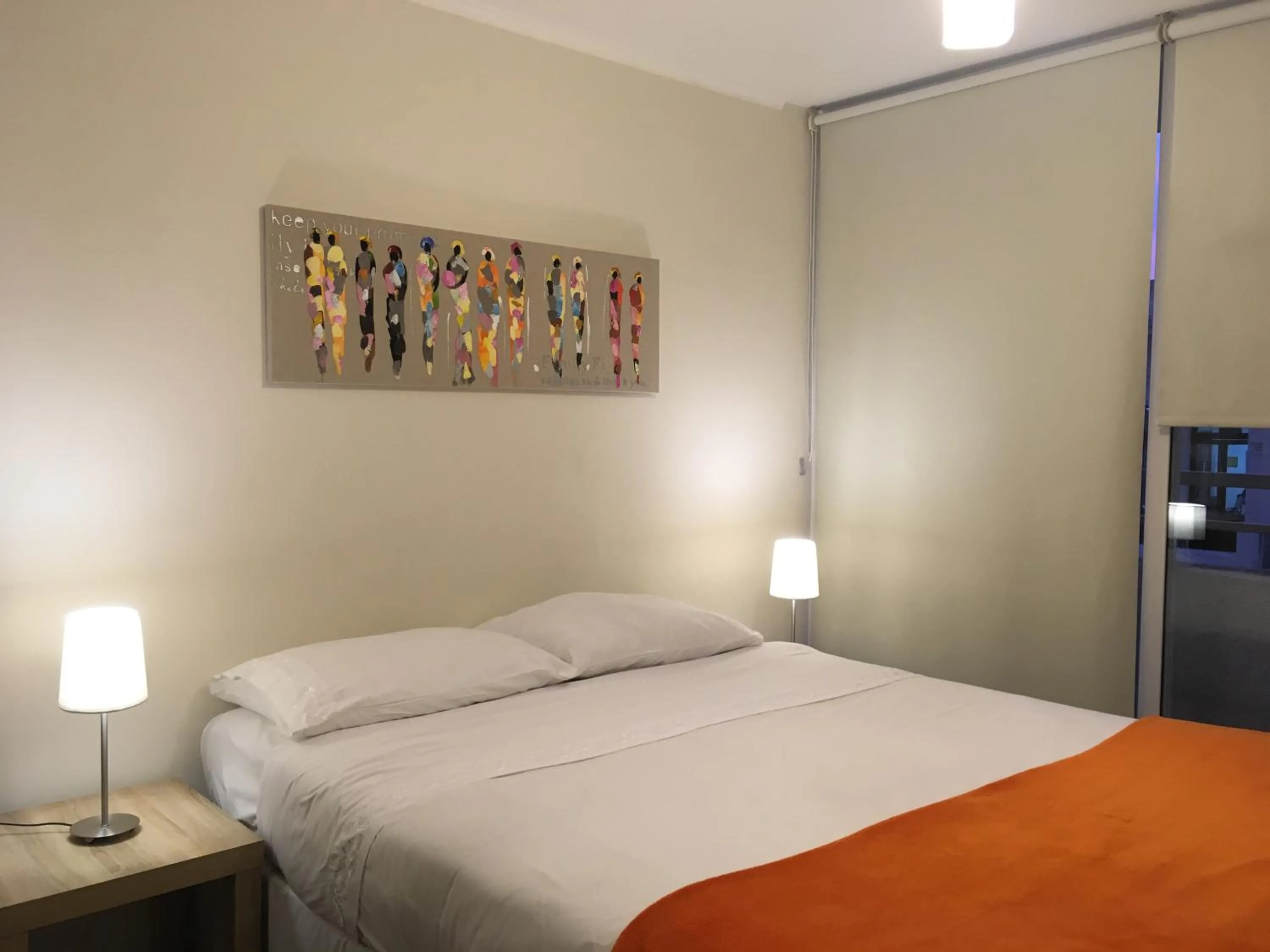 Bed in Moneda Express Apart