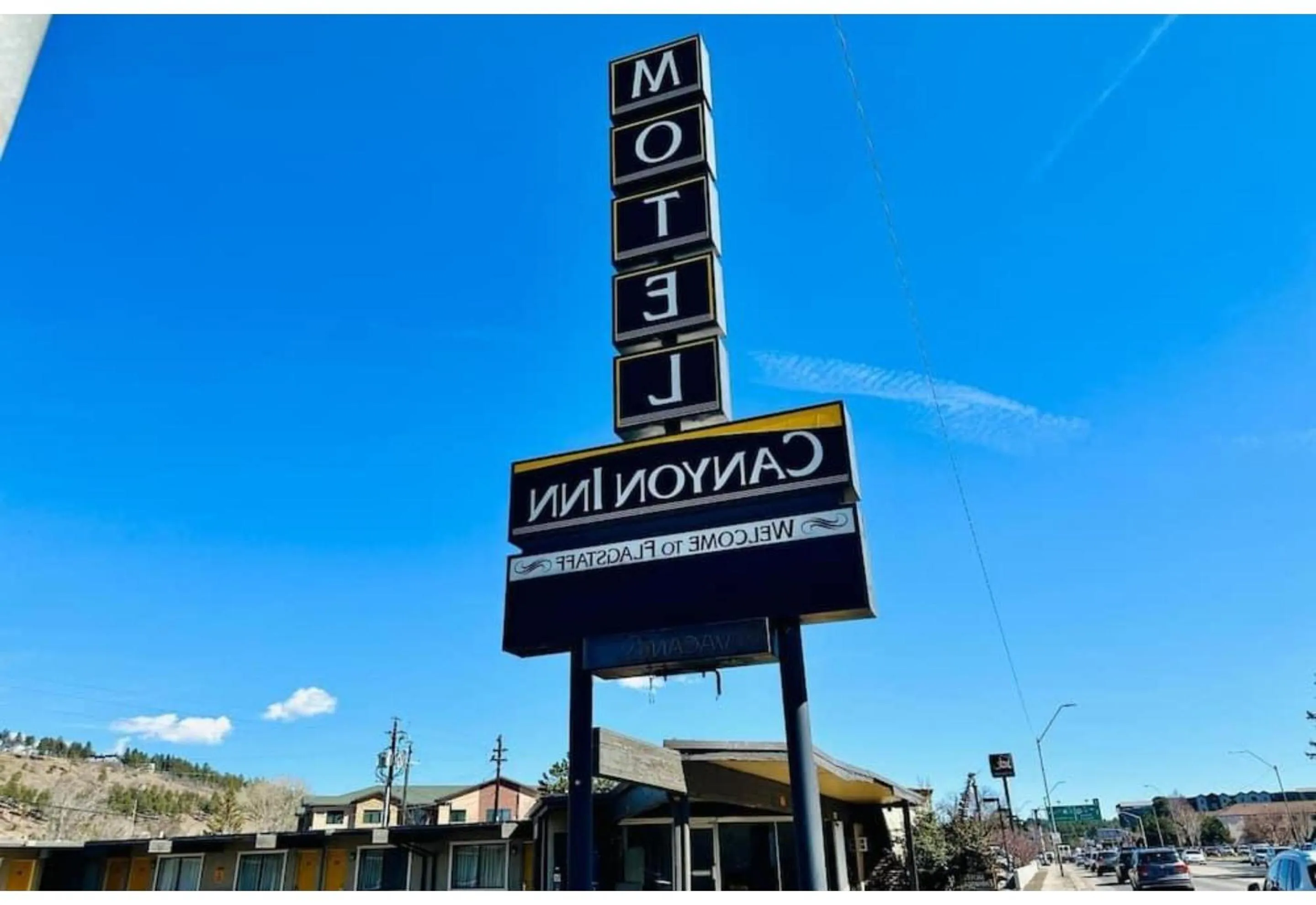 Property logo or sign in Canyon Inn Motel Flagstaff AZ