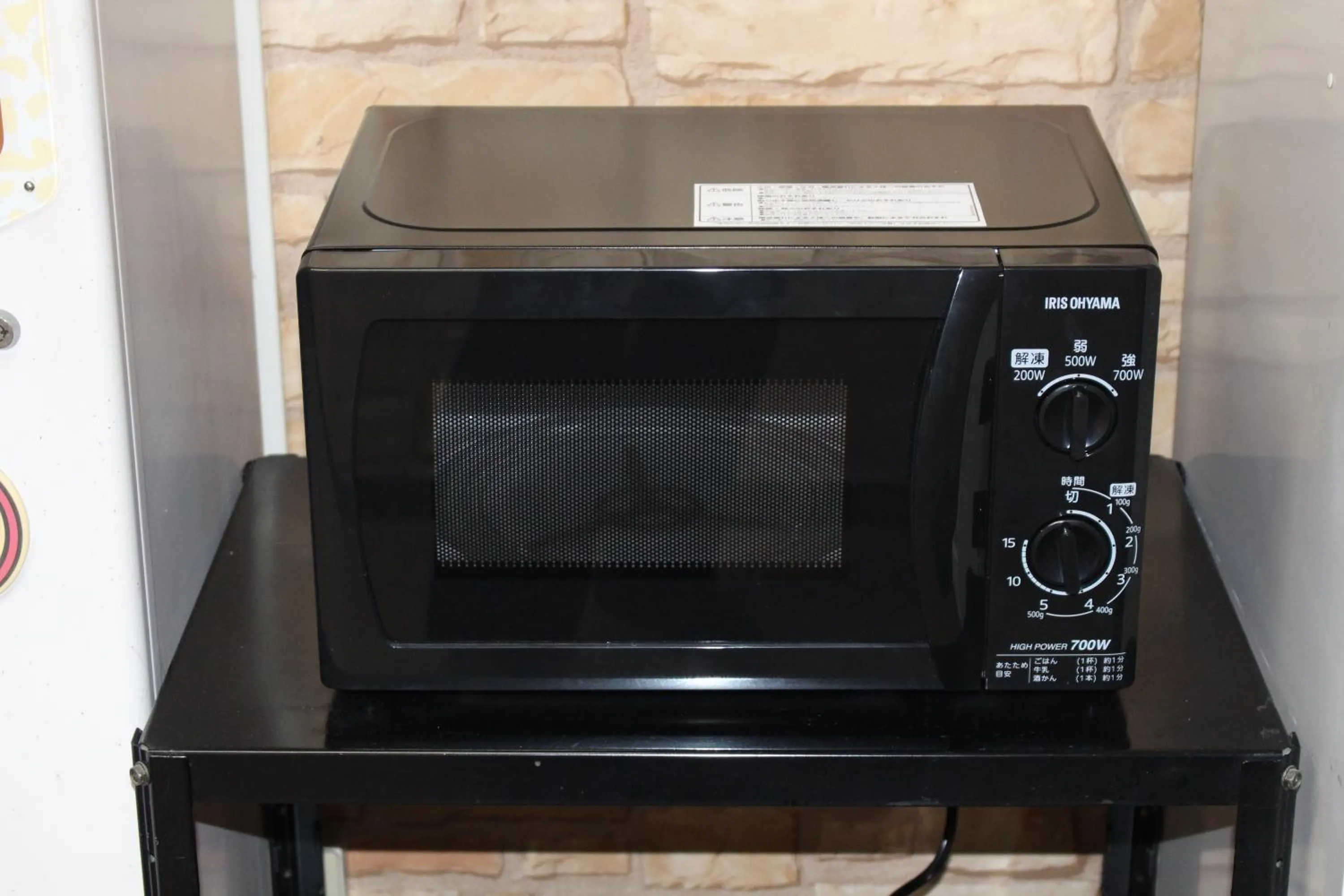 Communal kitchen, TV/Entertainment Center in Kyoto Horikawa Inn