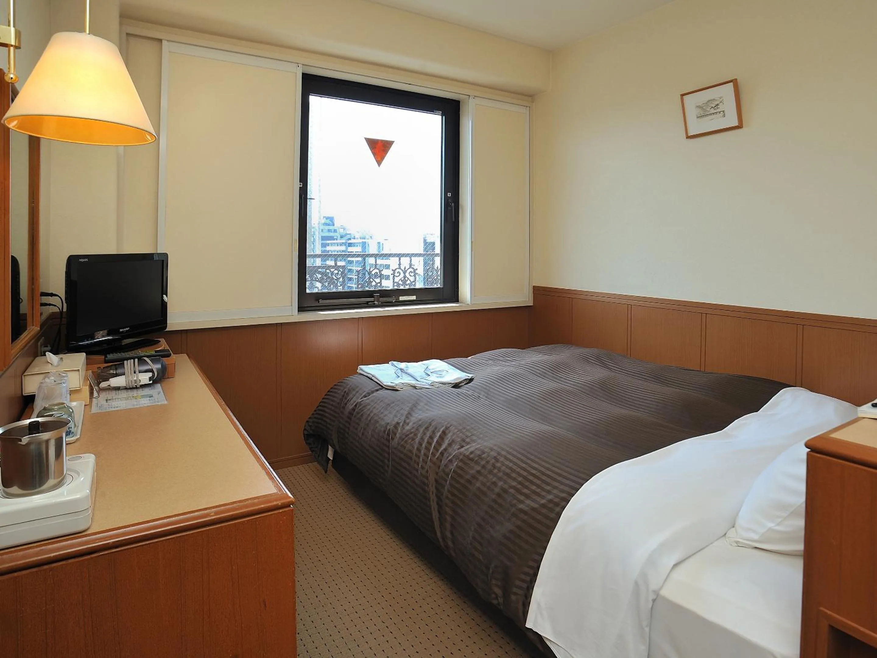 Bed in Kyoto Horikawa Inn