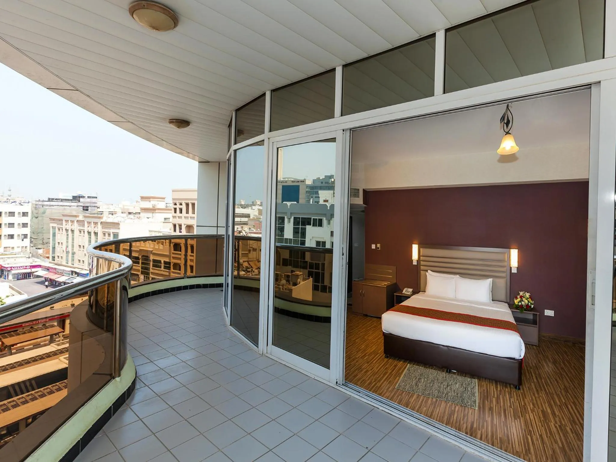 Balcony/Terrace, Bed in Wave International Hotel