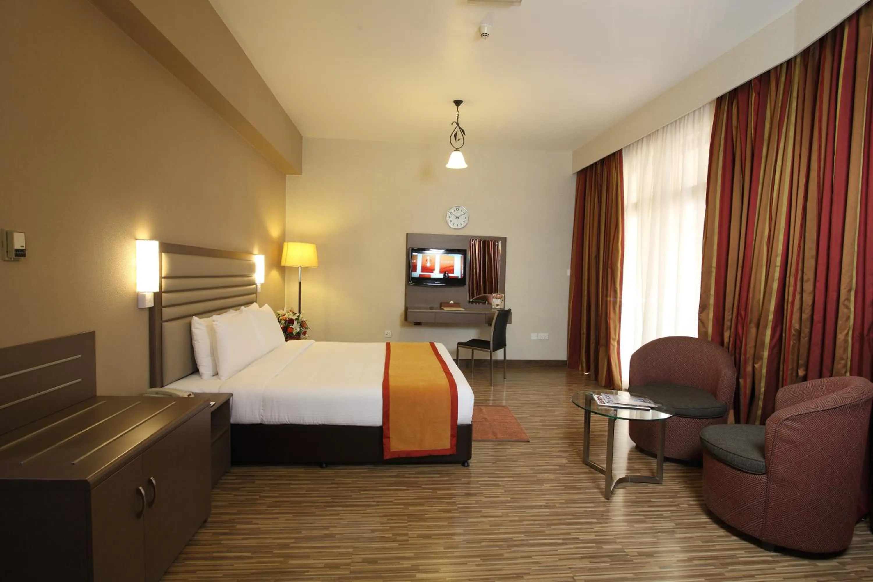 Photo of the whole room, Bed in Wave International Hotel