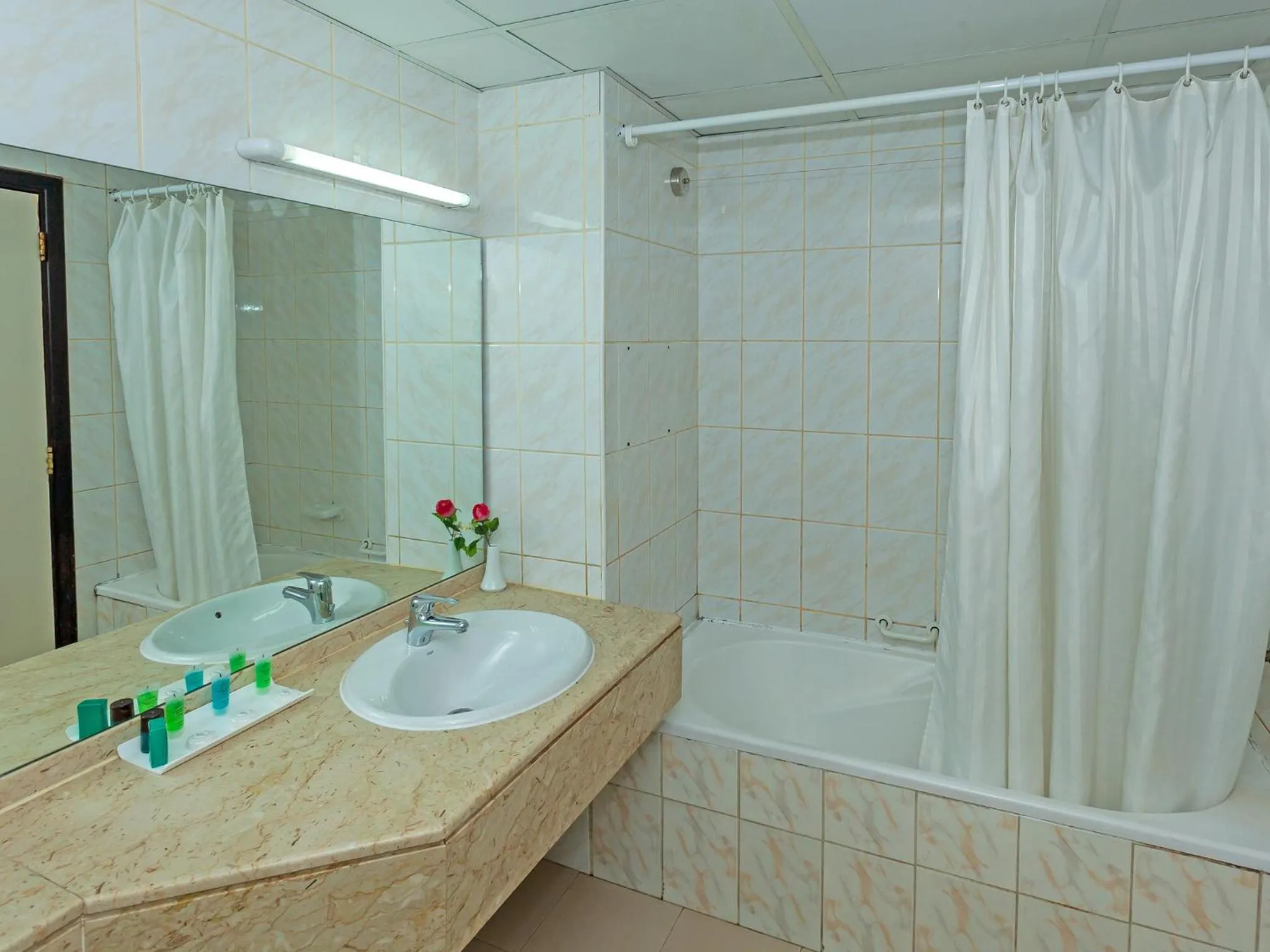 Bathroom in Wave International Hotel