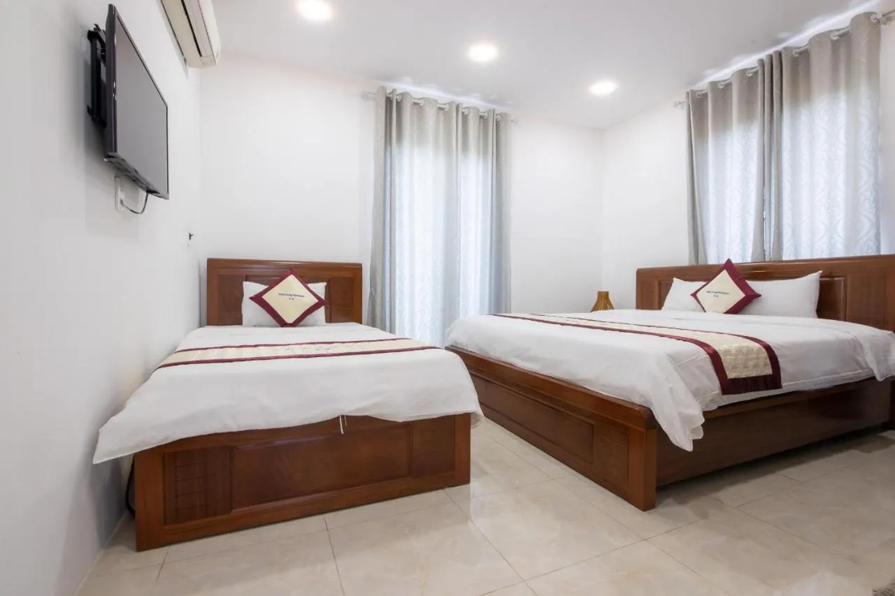 Bed in Hung Vuong Resort