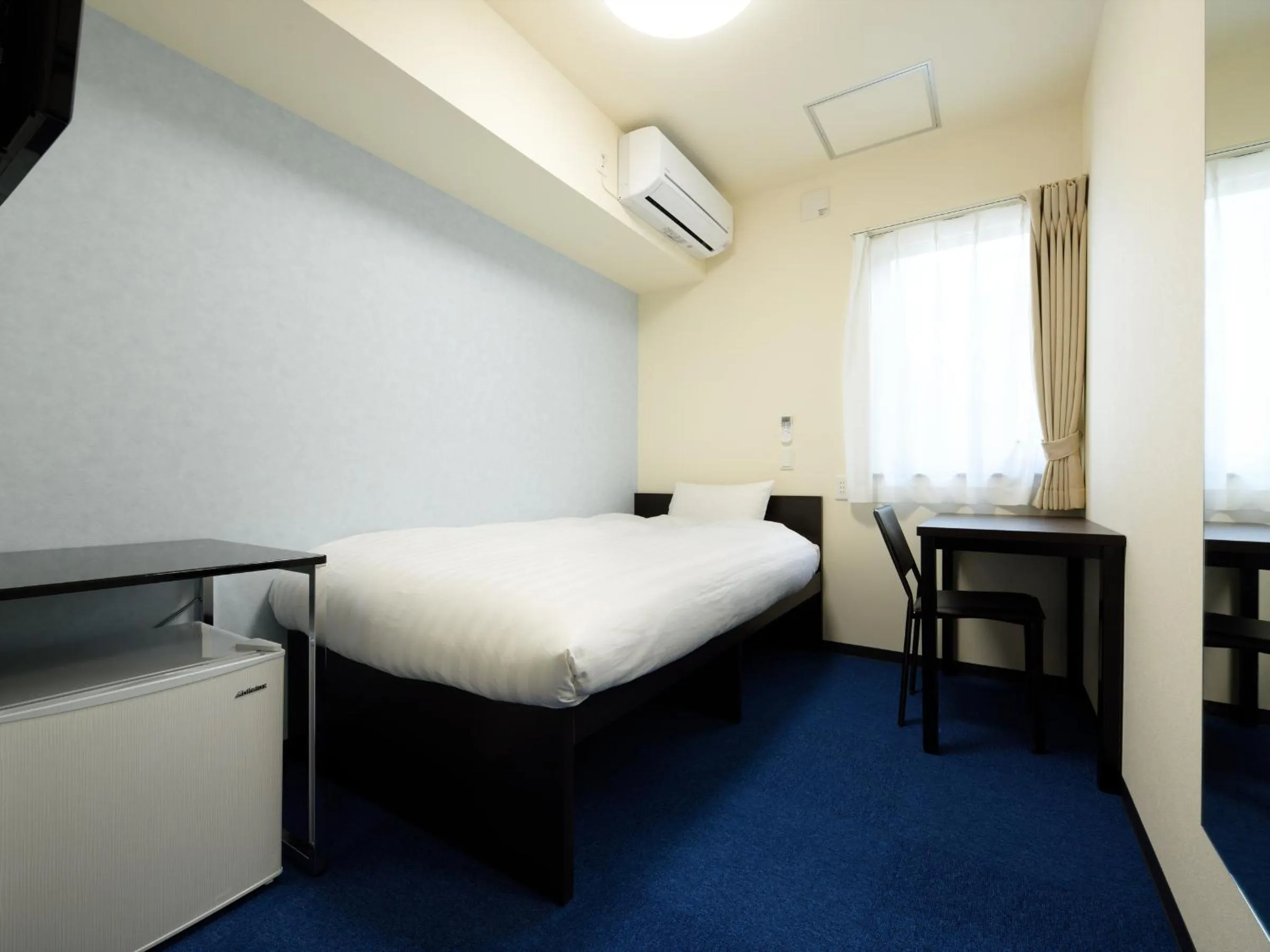 Bed in La'gent Inn Kesennuma