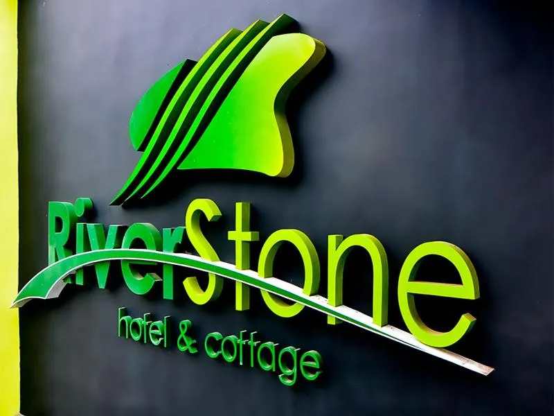 Property logo or sign in Riverstone Hotel & Cottage