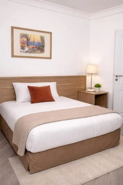 Bed in Hotel Montana Paris Lafayette