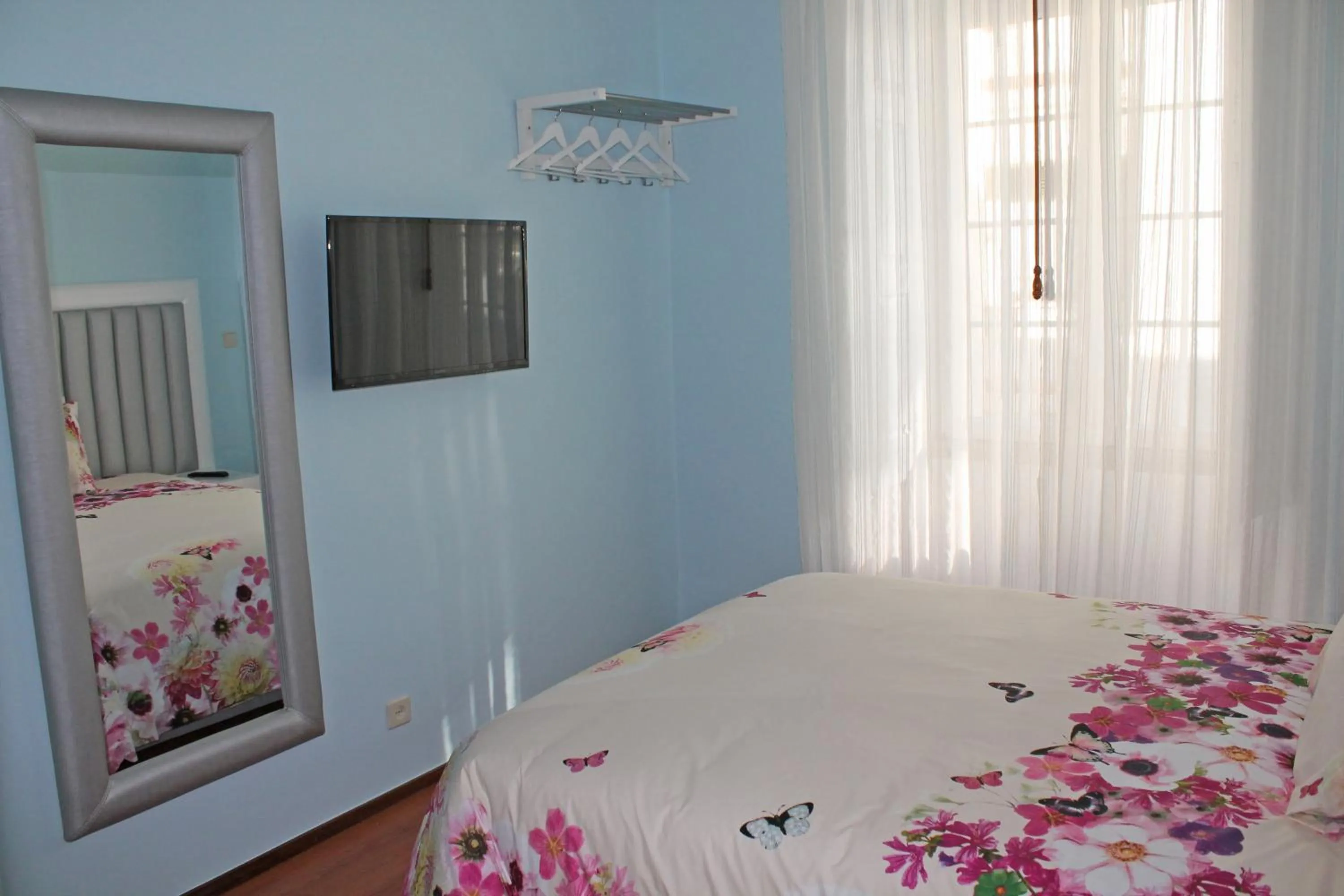 Bedroom, Bed in Grande Oceano Guest House