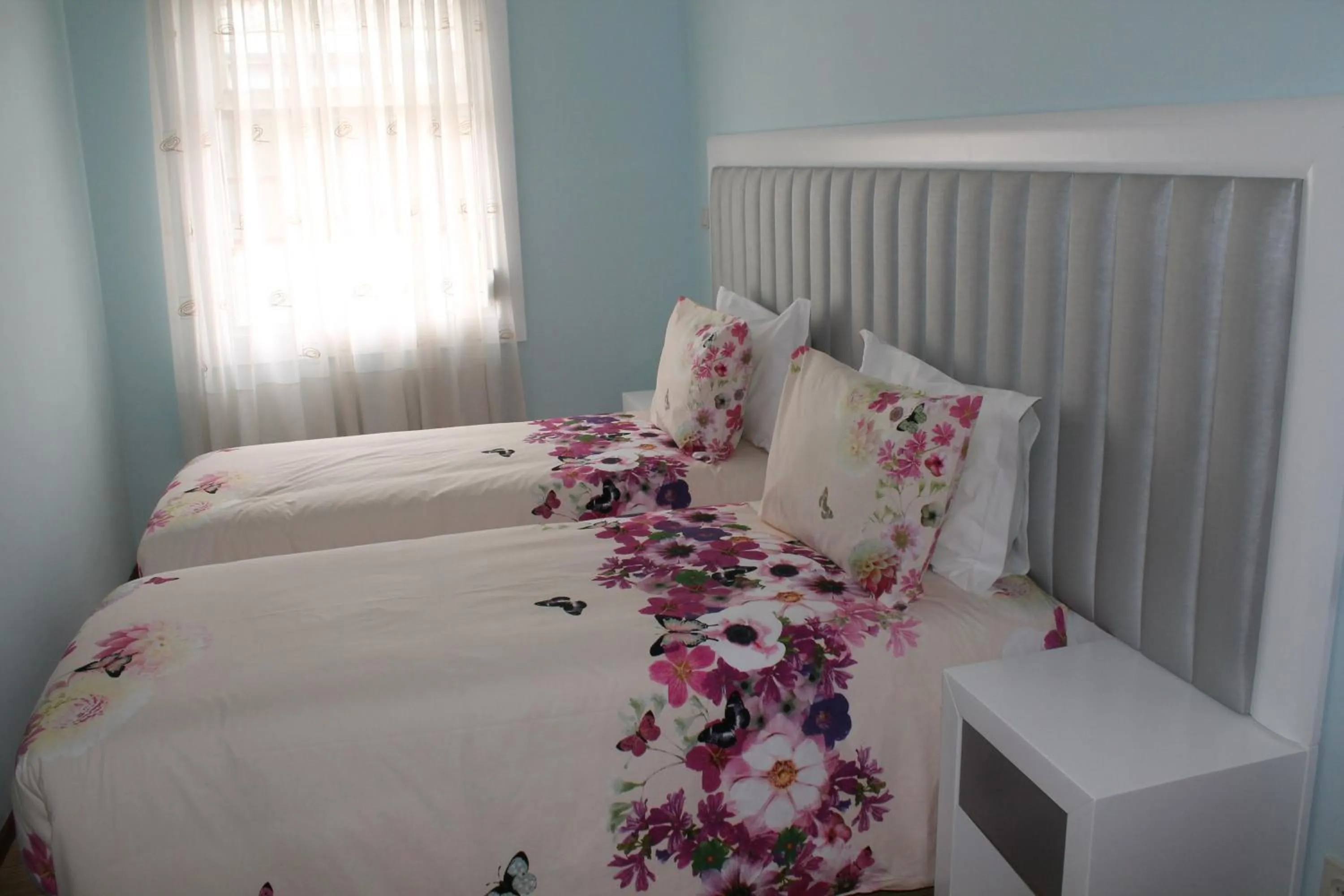 Bedroom, Bed in Grande Oceano Guest House