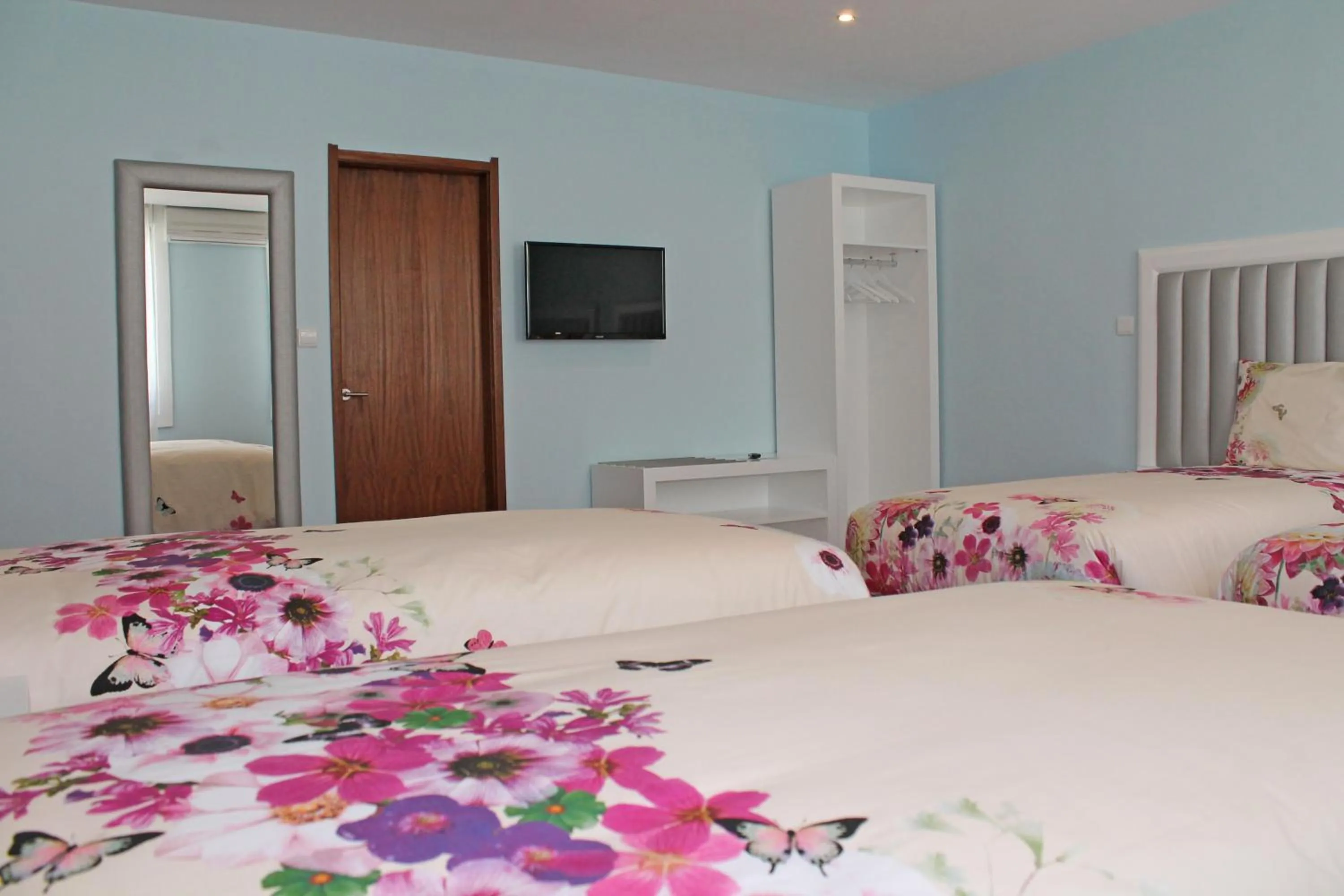 Bedroom, Bed in Grande Oceano Guest House