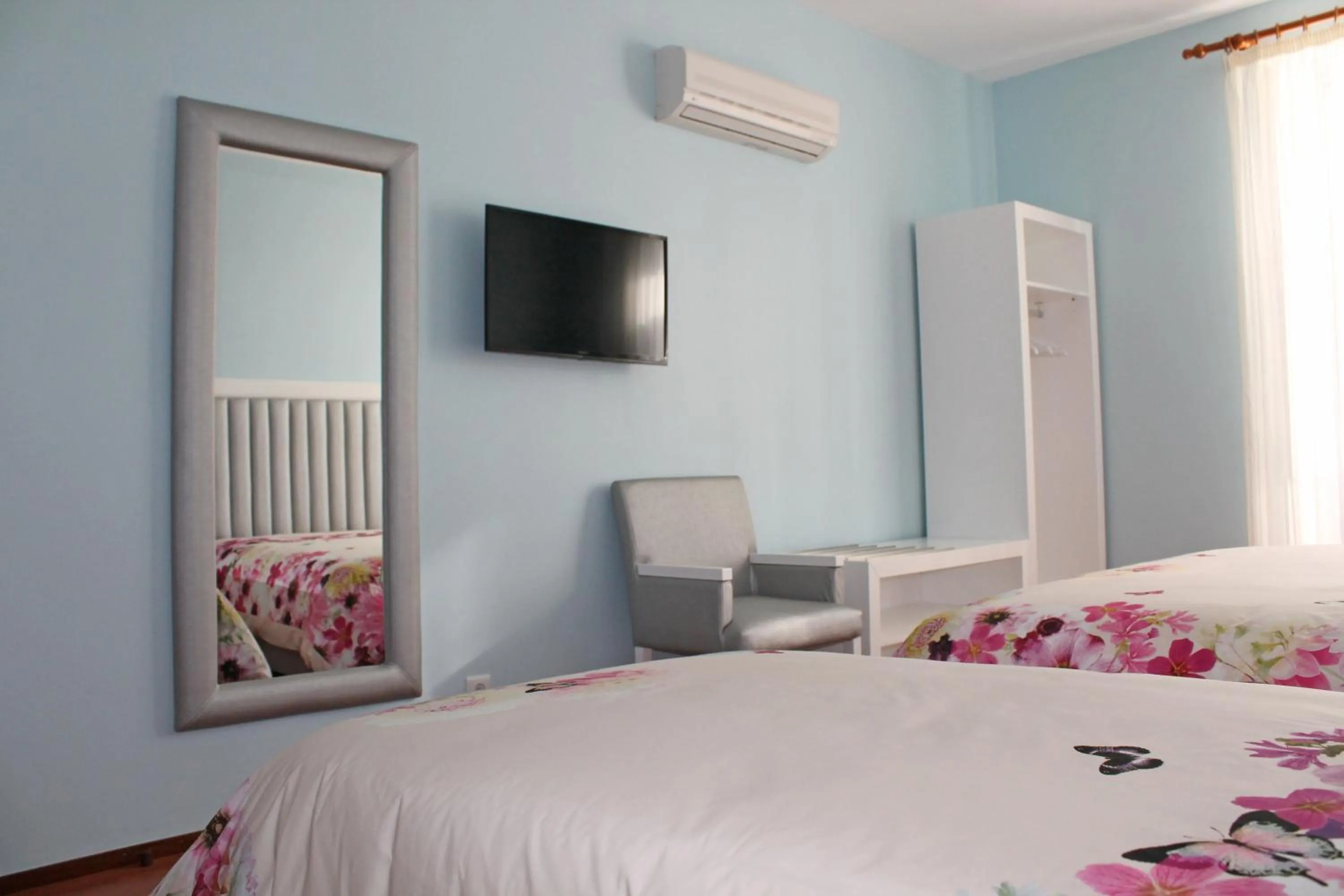 Bedroom, Bed in Grande Oceano Guest House