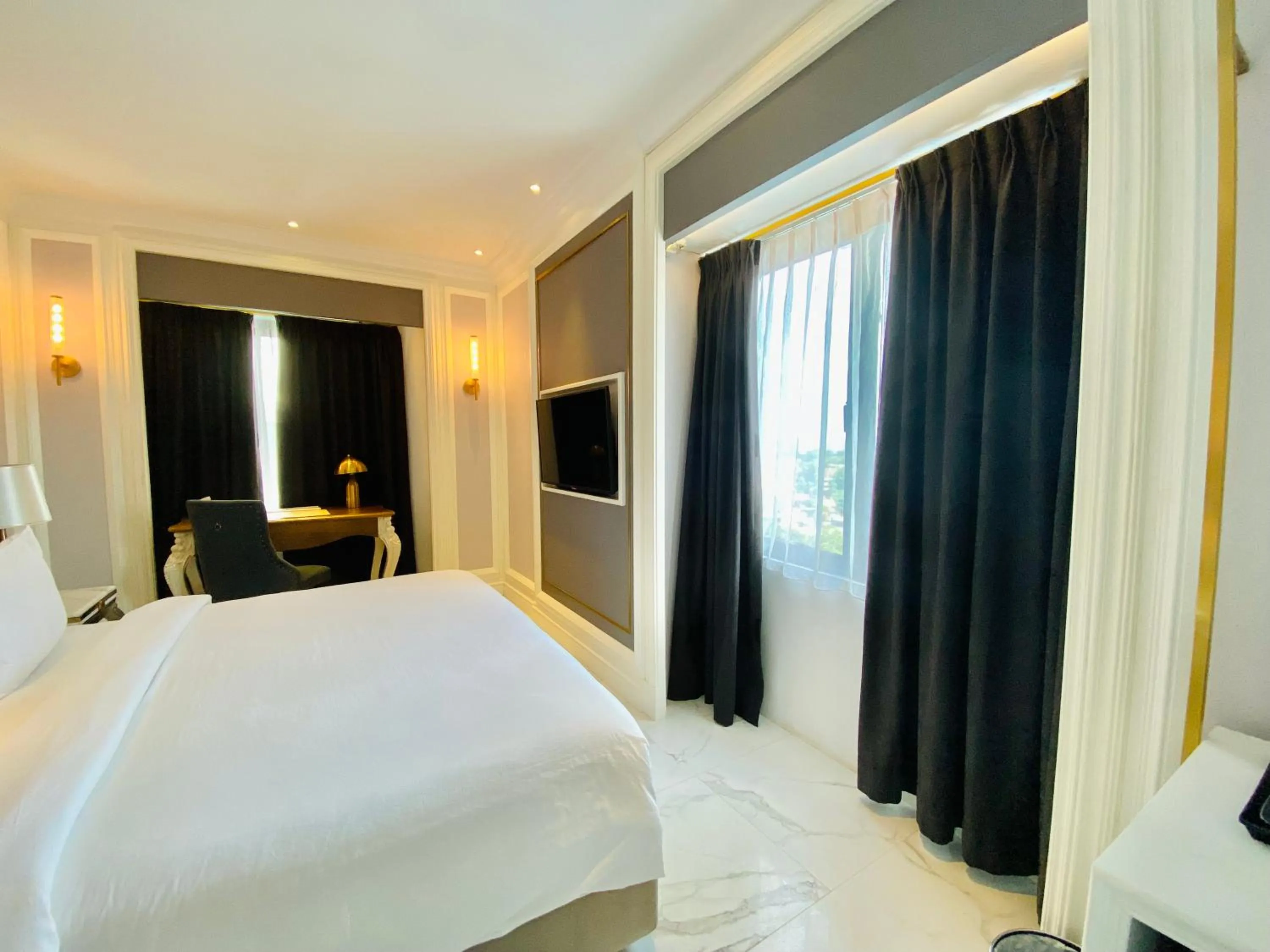 Bed in Grand Eska Hotel & Suites Batam
